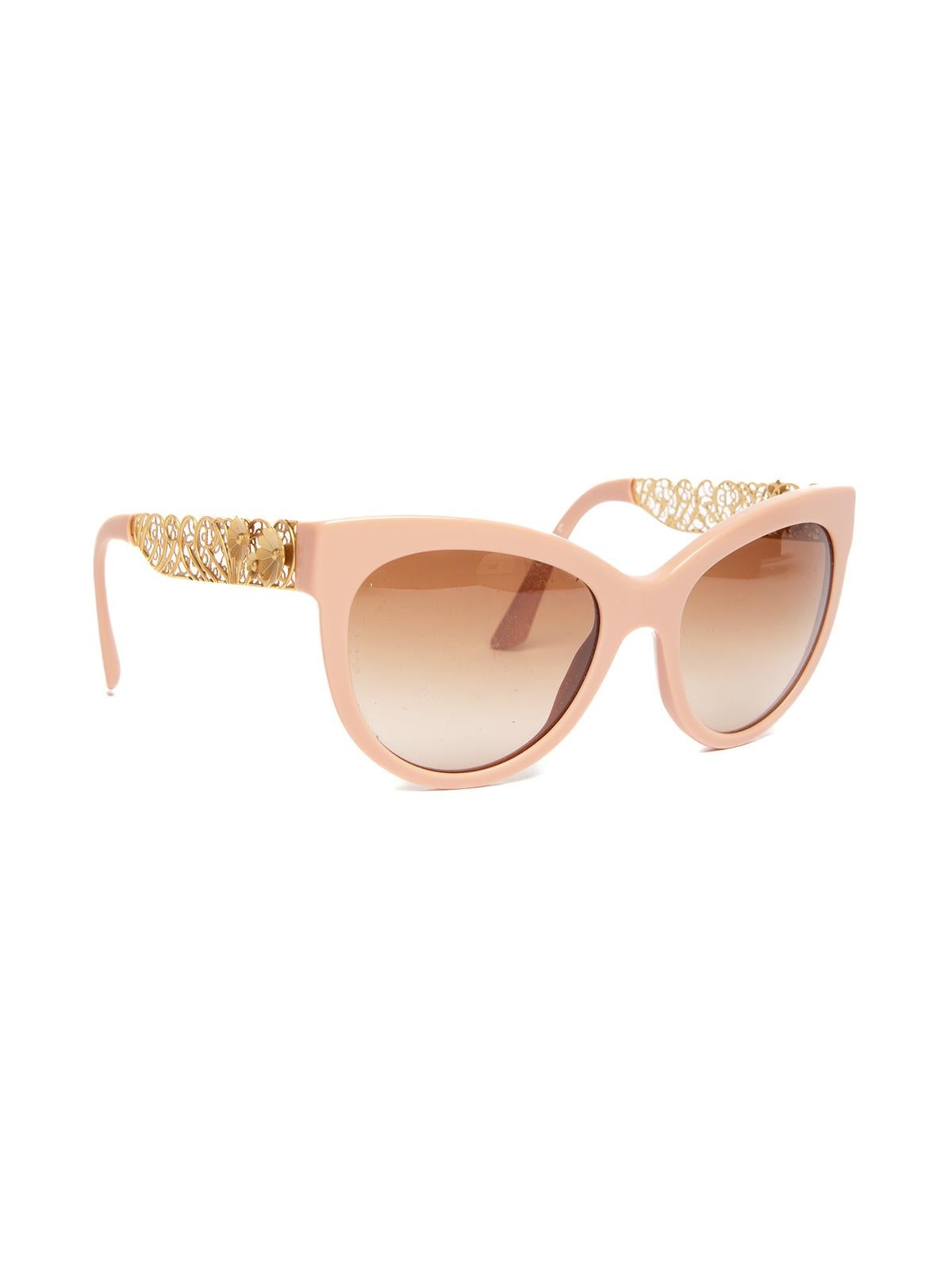 CONDITION is Very good. Minimal wear to sunglasses is evident. Rarely visible scratches to lenses on this used Dolce & Gabanna designer resale item. Details Pink & Gold Plastic & Metal Gold metal rose embroidery on arms Logo stamp embellished on