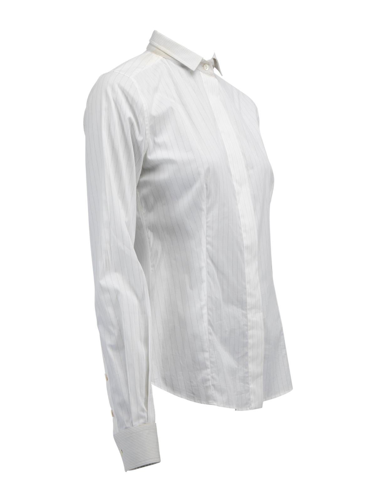CONDITION is Very good. Minimal wear to shirt is evident. Discolouring to cuff and a stain on the back of this used Dolce and Gabanna designer resale item. Details White Cotton Shirt Button up Striped Long sleeves Buttoned cuffs Button detachable