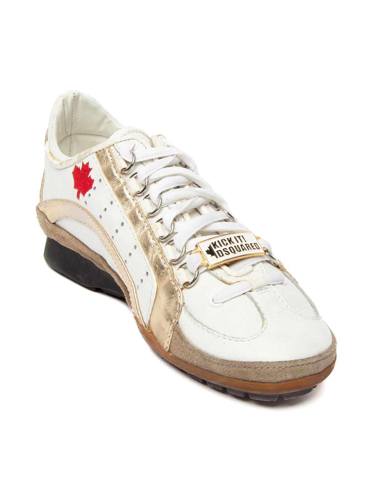 CONDITION is Good. General wear to sneakers is evident. Some scuff marks to exterior on this used DSquared2 designer resale item. Details Kick It! Colour - white, gold, grey Material - leather Style - low top Toe style - round Lace fastenings 1964