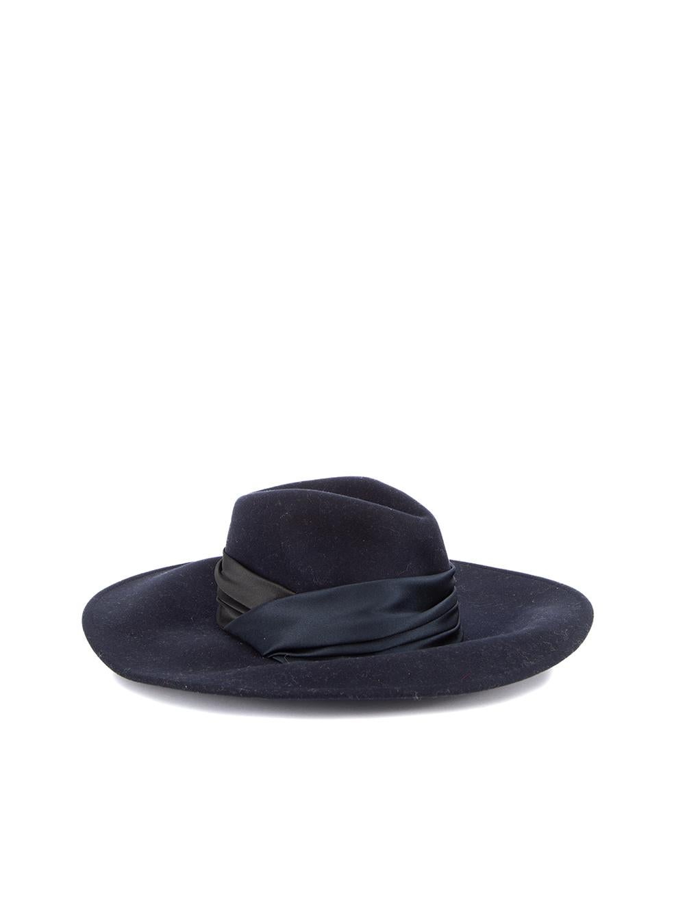 CONDITION is Very good. Minimal wear to hat is evident. Minimal wear to the outer fabric which attracts fluff and loose thread on this used Eugenia Kim designer resale item. Details Navy Wool Fedora hat Wide brim Adjustable drawstring on inner Made