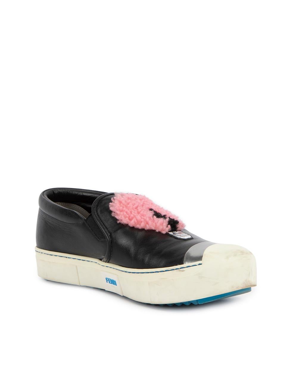 CONDITION is Very good. Minimal wear to slip ons is evident. Minimal wear to the toe point and midsole where scuffs/marks can be seen on this used Fendi designer resale item. Details Black Leather Pink wool light bulb icon Yellow wool apple icon