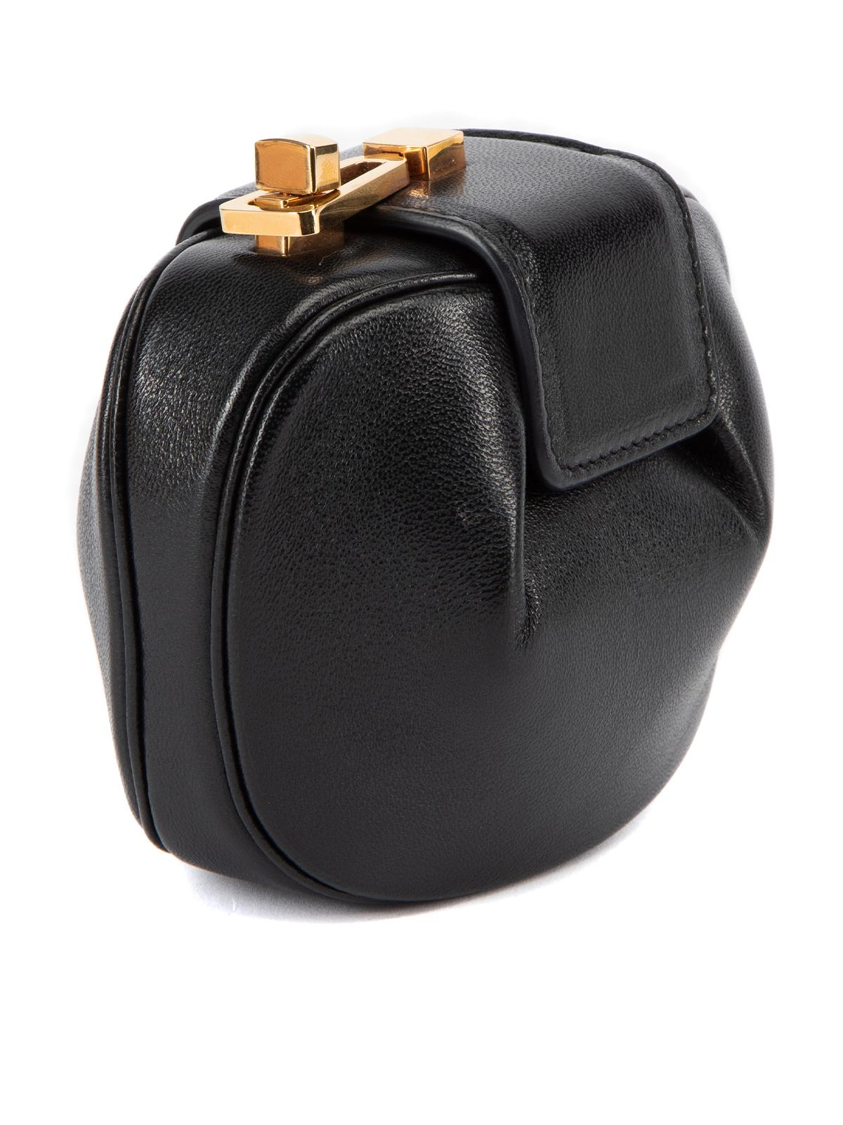 CONDITION is Very good. Hardly any visible wear to coin purse is evident on this used Gabriella Hearst designer resale item. This item comes with the original dustbag. Details Black Leather Coin purse Rounded shape Turn lock closure Gold tone