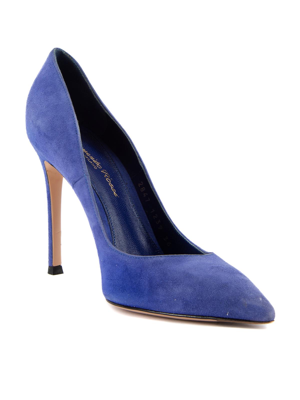 CONDITION is Good. Minor wear to heels is evident. Light wear/fading to suede exterior and minimal wear to the outsole on this used Gianvitto Rossi designer resale item. Details Indigo Suede Slip on heels Pointed toe Stiletto heel Made in Italy