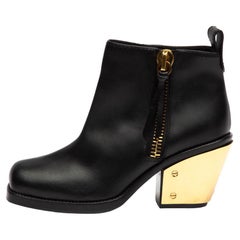 Pre-Loved Giuseppe Zanotti Women's Gold Heels Ankle Boots Black Leather