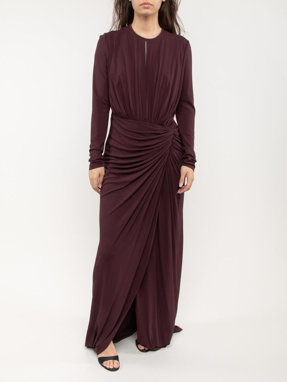 CONDITION is Very good. Minimal wear and pilling to dress is evident on this used Givenchy designer resale item. Details Purple Viscose Maxi dress Figure hugging Long sleeves Slit on left aide of the dress Round neckline Zip up fastening on back