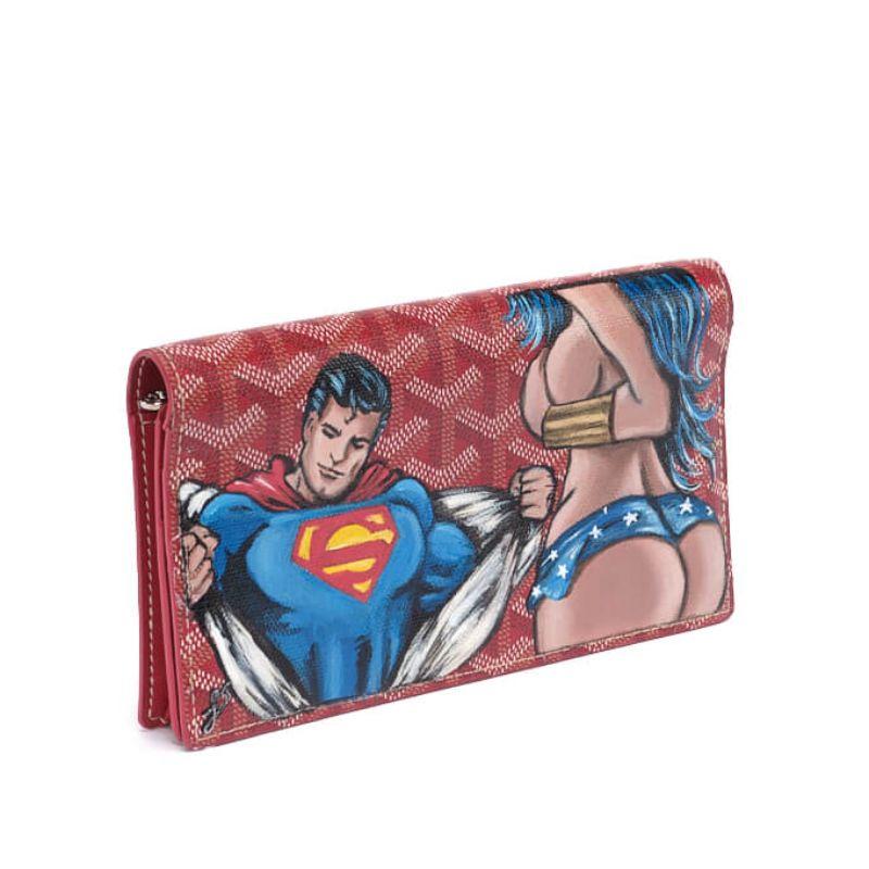 Colour - Red Highlights Limited Edition CSD x Janan Studio Wallet Intricately Hand-Painted Zipper Closure Frontal Magnetic Closure Six Card Slots Details Length: 10cm Width: 18. 5cm Depth: 1cm Fabric: Leather Condition Very good, includes box. All