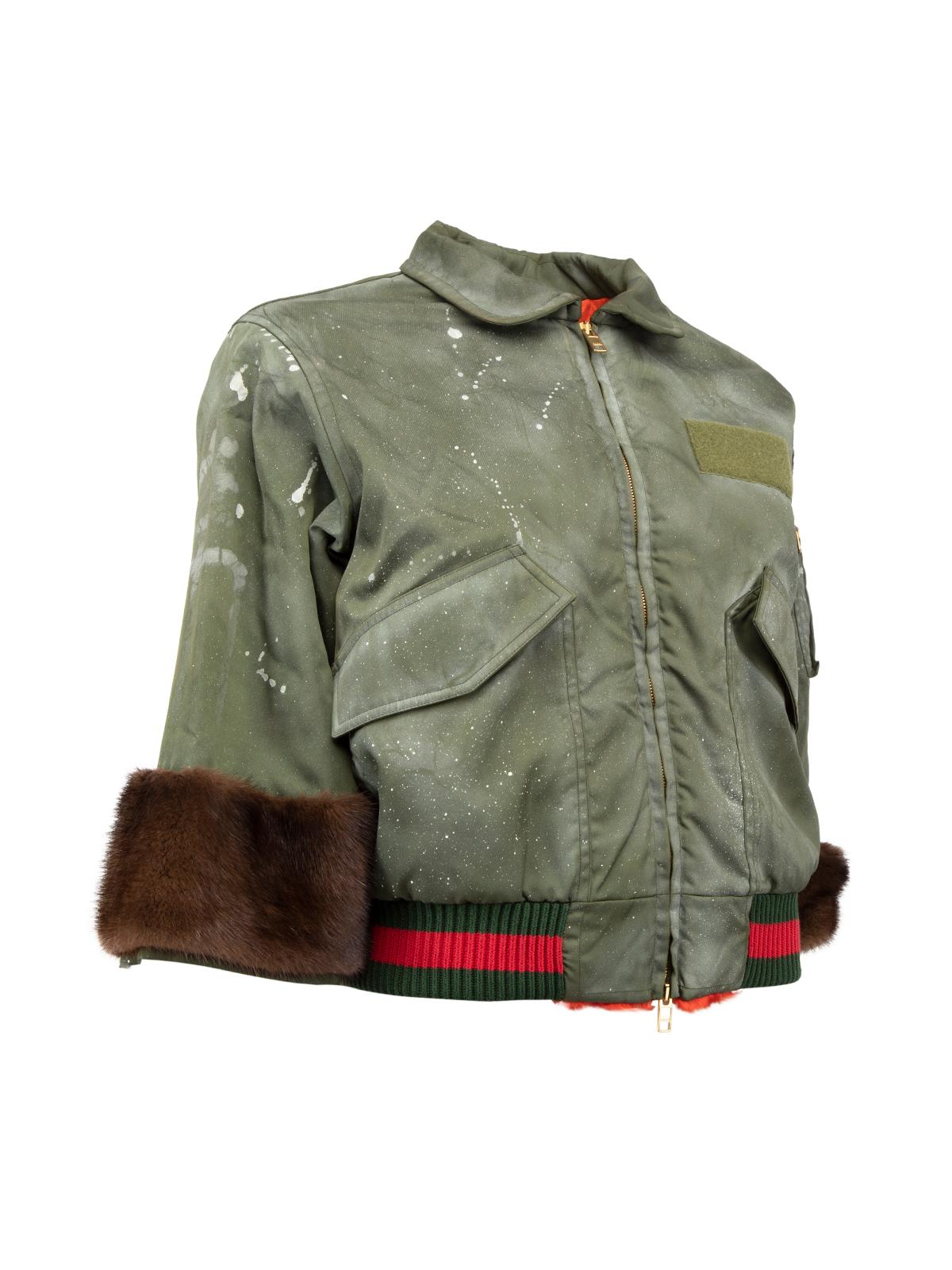 CONDITION is Very good. Hardly any visible wear to jacket is evident on this used Gucci designer resale item. Paint splatter is part of the design Details Green Mink cuffs Polyamide Zip fastening Round neck Made in Italy Composition Dyed lamb,