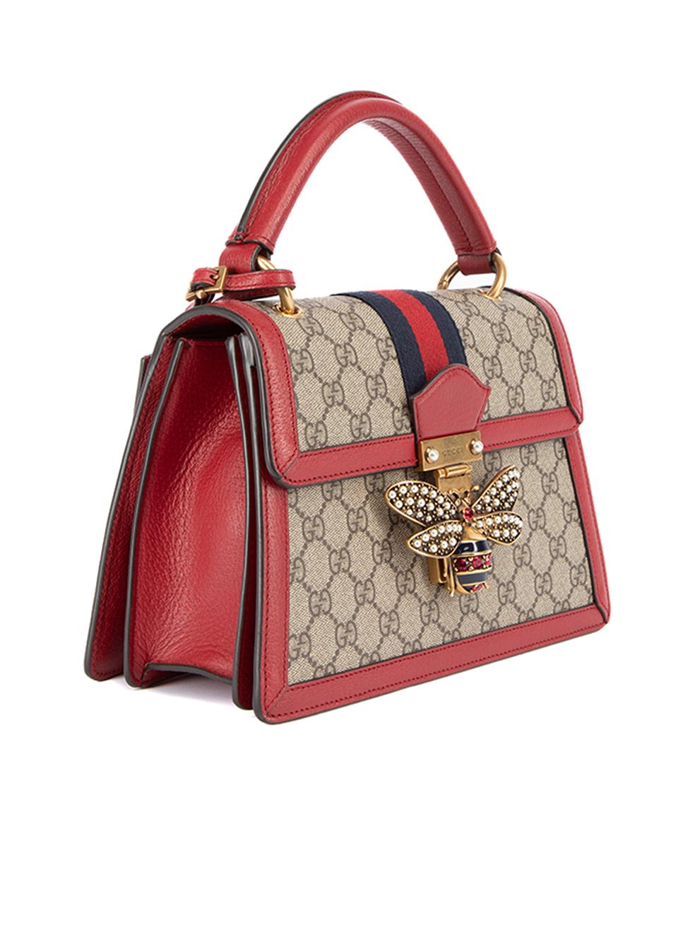 CONDITION is Very good. Minimal wear to bag is evident. Minimal wear to the gold hardware on this used Gucci designer resale item. Details Brown and red Canvas and leather Small top handle bag GG supreme pattern 1x Red leather top handle 1x