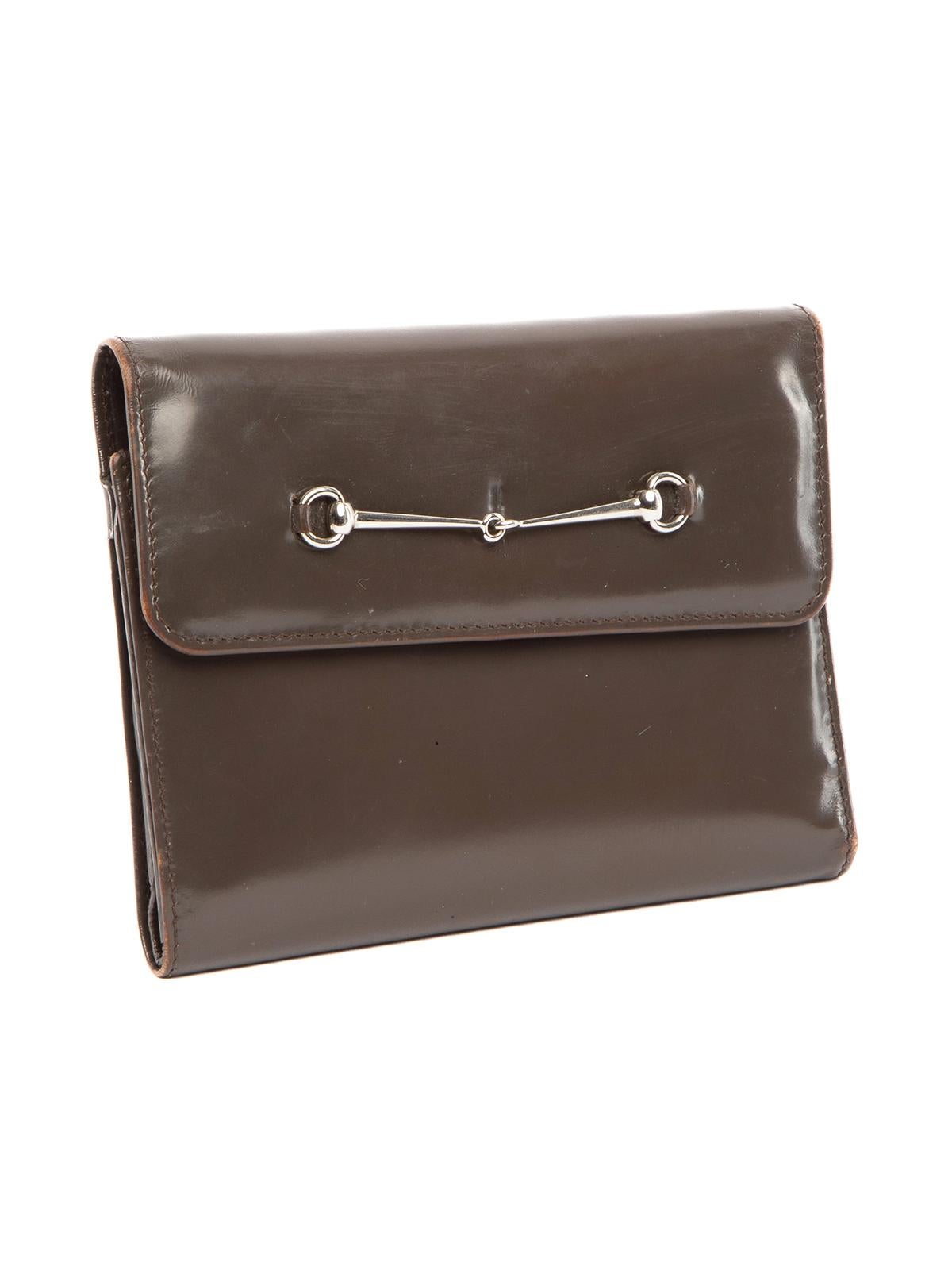CONDITION is Good. General wear to wallet is evident. Moderate signs of wear to leather material all over and around the trim. Signs of wear to the interior on this used Gucci designer resale item. Details Colour - brown Material - leather Silver