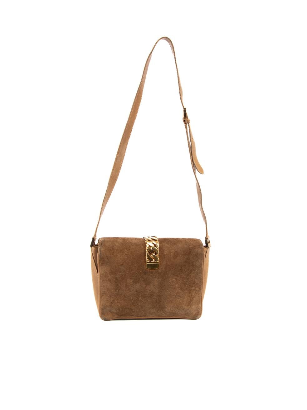 CONDITION is Good. General wear to bag is evident. Overall wear to suede exterior, tarnishing to the gold chain accent and pen marks to the interior suede material can be seen on this used Gucci designer resale item. Details Brown Suede and leather
