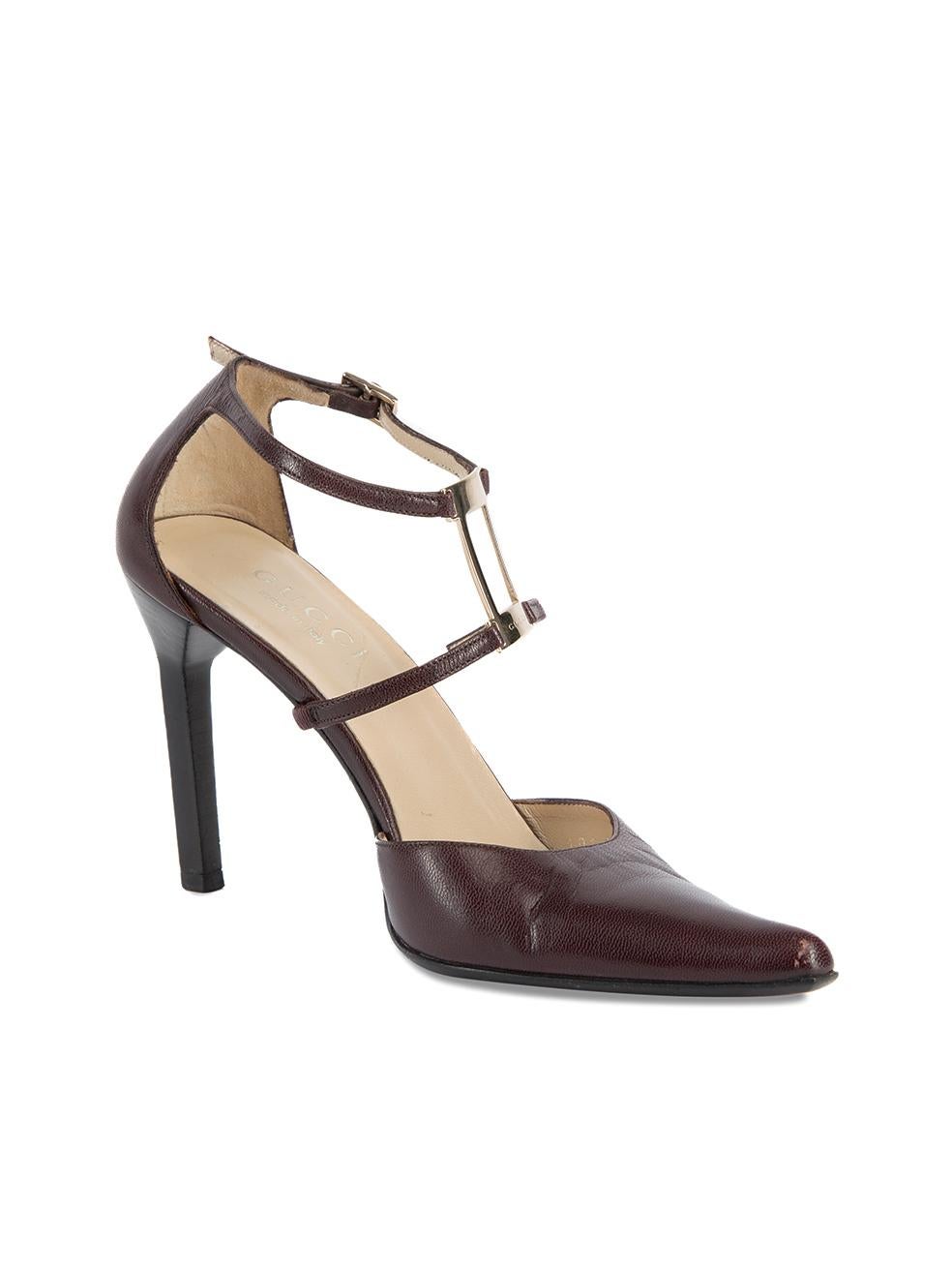 CONDITION is Very good. Minimal wear to heels is evident. Creasing to leather material near the toes on both shoes can be seen on this used Gucci designer resale item. Details Dark purple Leather Pointed toe Stiletto heel Strappy with Gucci engraved