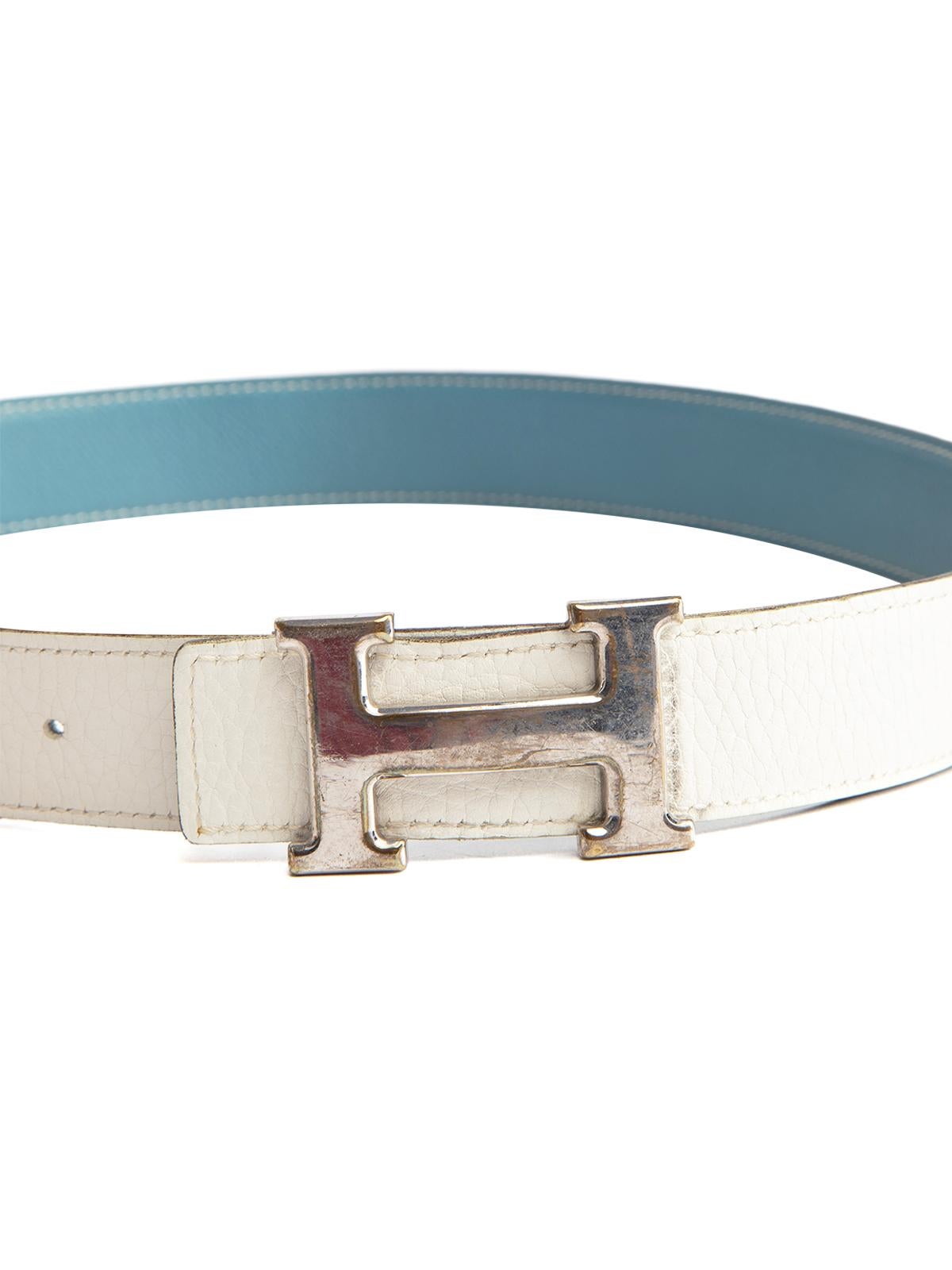 CONDITION is Good. Minor wear to belt is evident. Light wear to leather material and some stain to interior of belt near the buckle on this used Hermes designer resale item. Details Blue, white Leather Reversible Silver H logo buckle Comes with