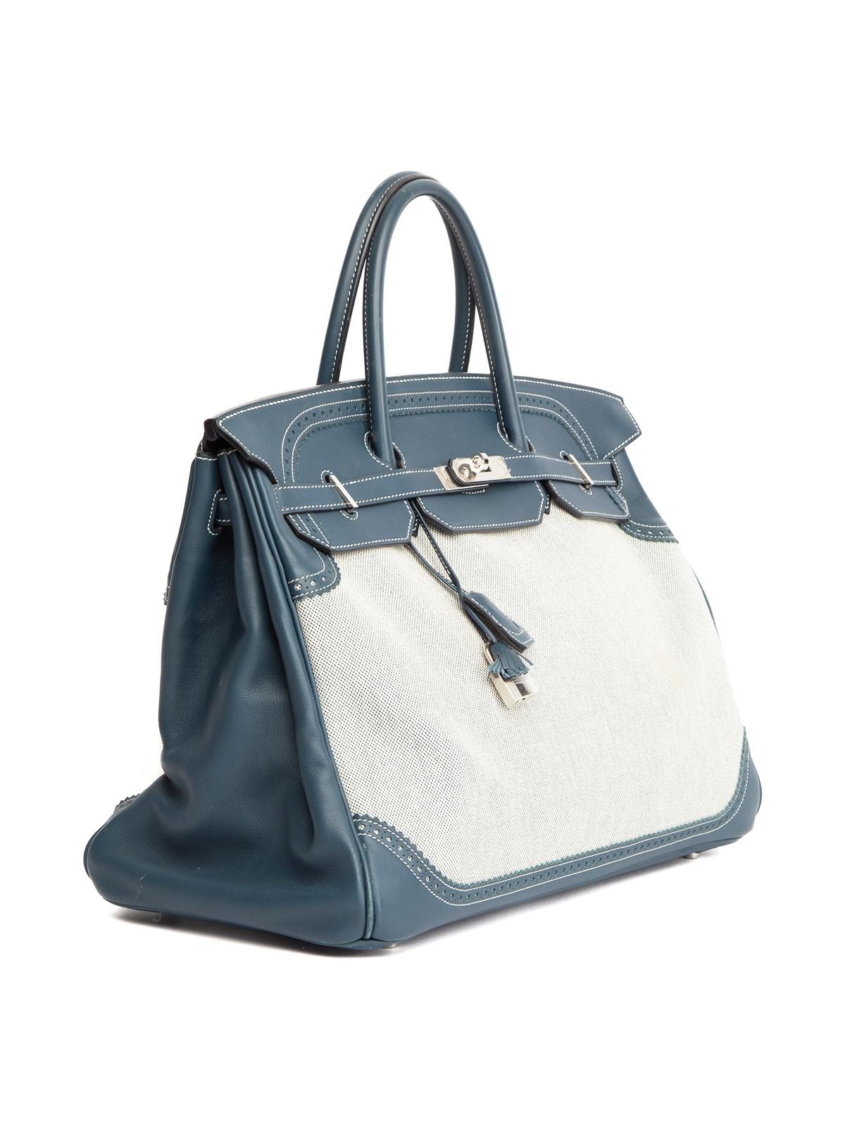 CONDITION is Very good. Minor wear to bag is evident. Light wear to canvas material and exterior leather, interior, and handle on this used Hermes designer resale item. Details Colour - blue and grey Material - leather and canvas Handles x 2