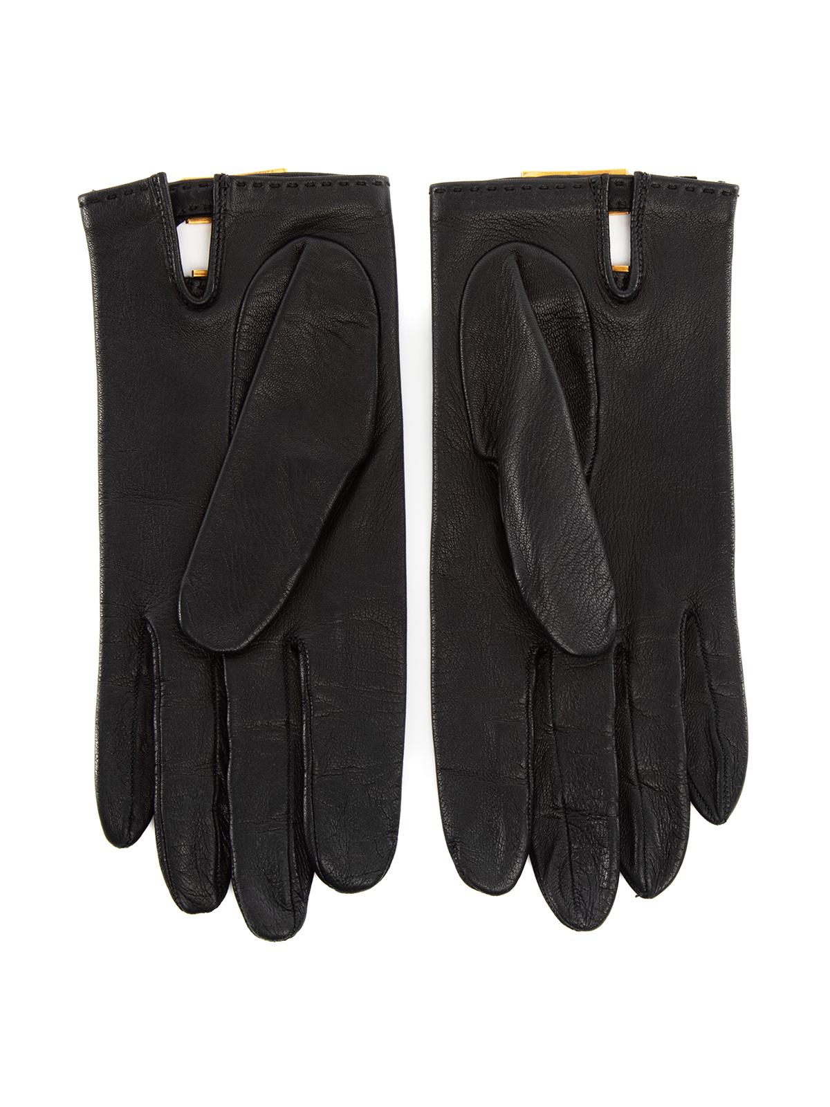 Condition is Very good. Minimal wear to gloves is evident on this used Hermes designer resale item. Details Colour - black Material - leather Embellishments- gold tone hardware Made in France Composition EXTERIOR:(Leather) INTERIOR: (suede) Size &