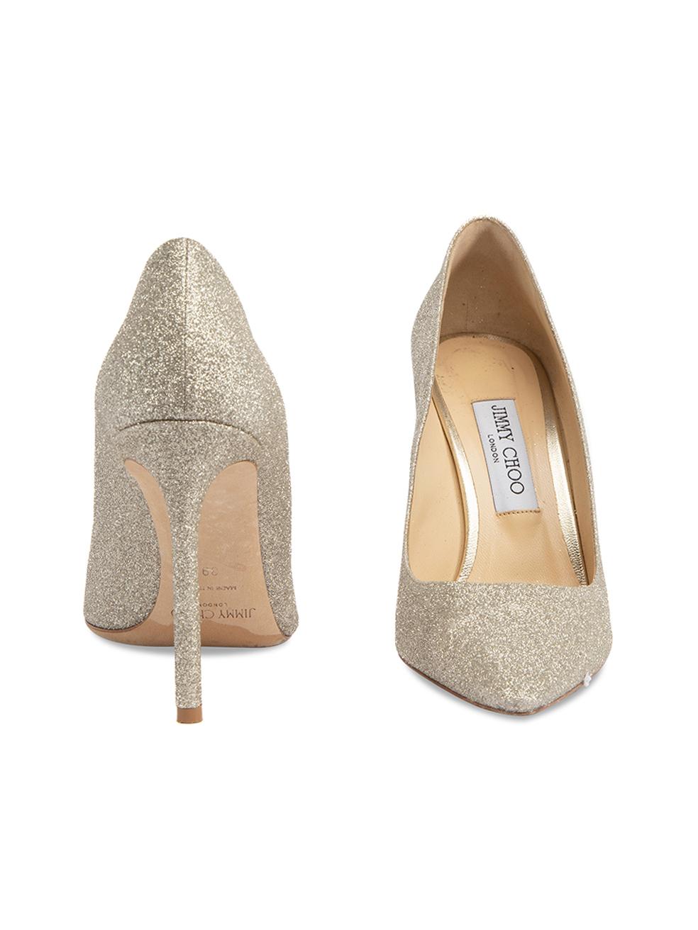 CONDITION is Very good. Minimal wear to heels is evident. Minimal wear to the outsole on this used Jimmy Choo designer resale item. This item includes the original dustbag where dark marks can be seen. . Details Silver Glitter Skip on pumps Pointed