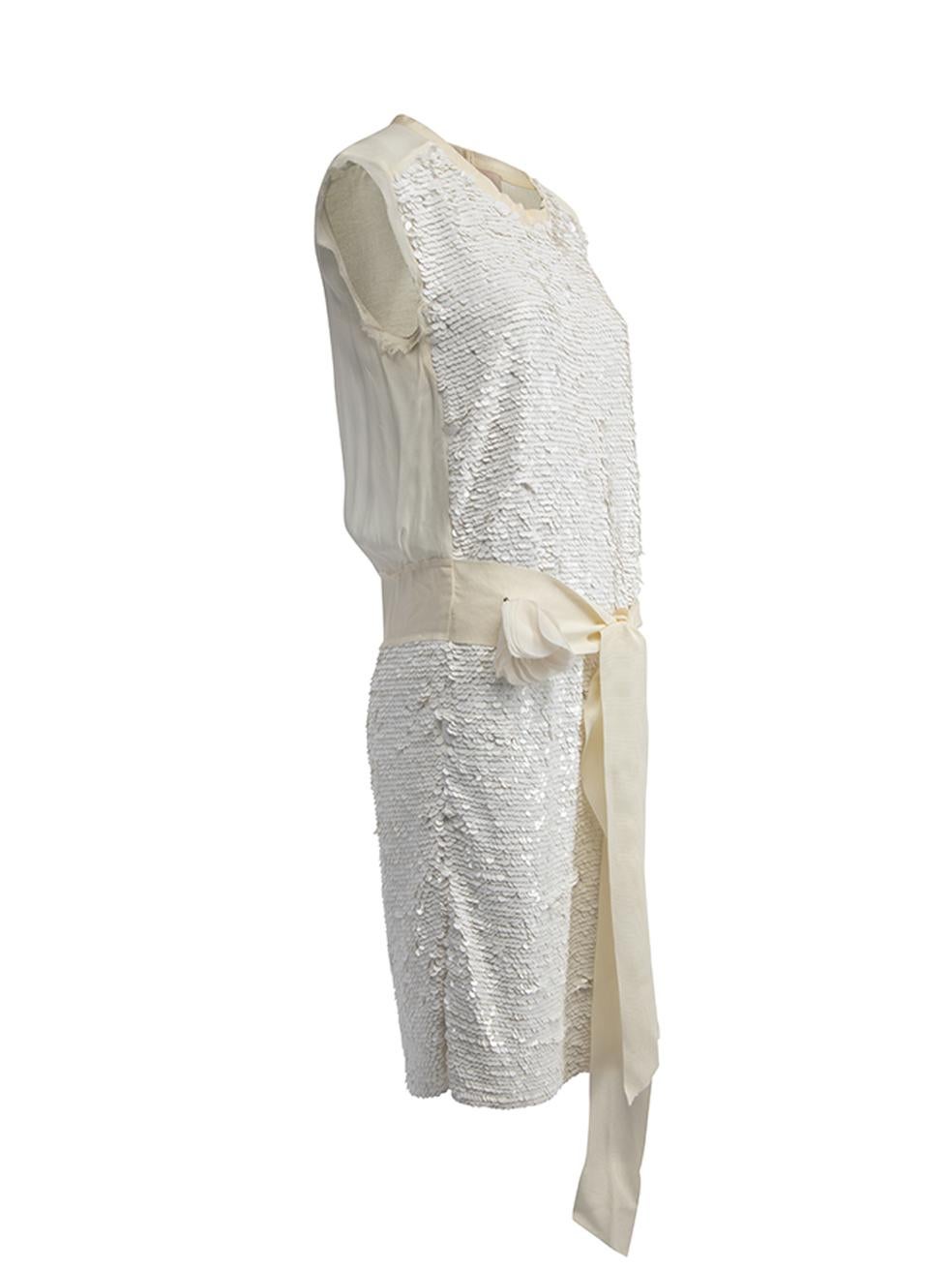 CONDITION is Very good. Minimal wear to dress is evident. Minimal wear to the neckline and flower attachment on this used Lanvin designer resale item. Details Cream Synthetic Sleeveless mini dress Sequinned Round neckline Tie waist ribbon with