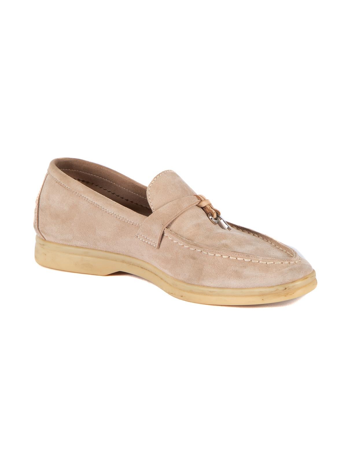 CONDITION is Good. Overall wear to loafers is evident. Some scuff marks can be seen to toes and soles of this used Loro Piana designer resale item. Details Beige Suede Flat Almond toe Silver tone charms Slip on Made in Italy Composition EXTERIOR: