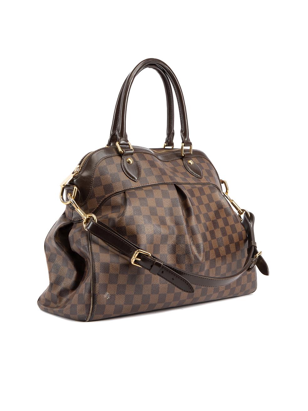 CONDITION is Good. Minor wear to bag is evident. Light wear/scuffs to the leather exterior, and significant signs of wear to the suede interior where pen marks/stains can be seen on this used Louis Vuitton designer resale item. Details 2010 Brown