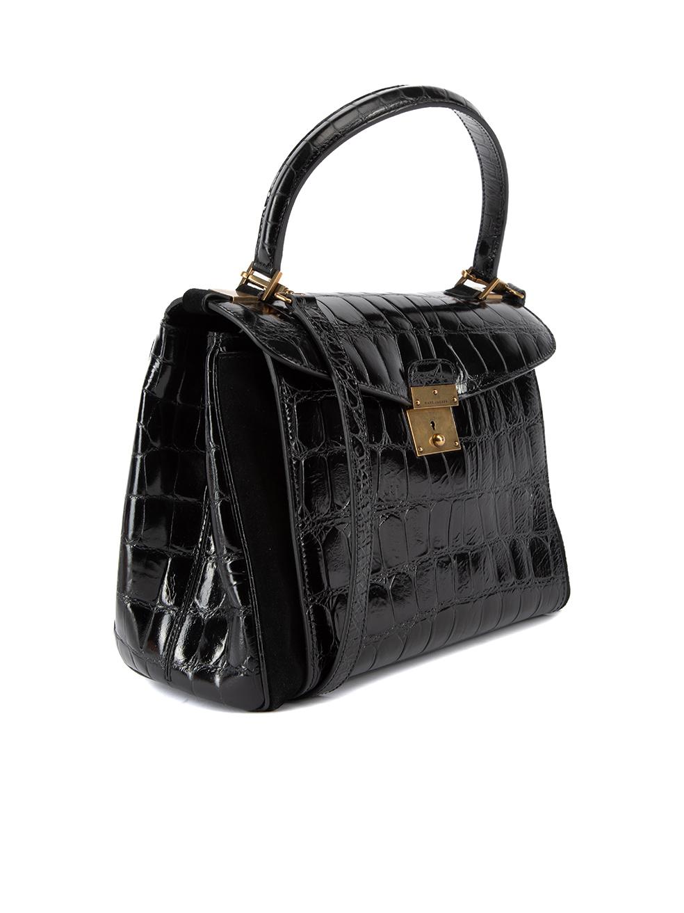 CONDITION is Very good. Hardly any visible wear to bag is evident. There is very minimal wear to the gold/bronze hardware and suede exterior on the sides on this used Marc Jacobs designer resale item. Details Black Exotic leather and suede Large