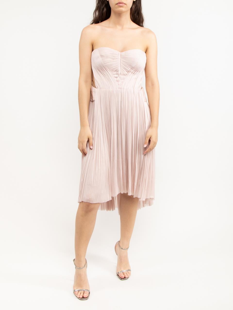 CONDITION is Very good. Minimal wear and pilling to dress is evident on this used Maria Lucia Hohan designer resale item. Details Pink Polyamide Pleated effect Asymmetric dress Strapless Hidden hook fastening Backless effect Made in Romania