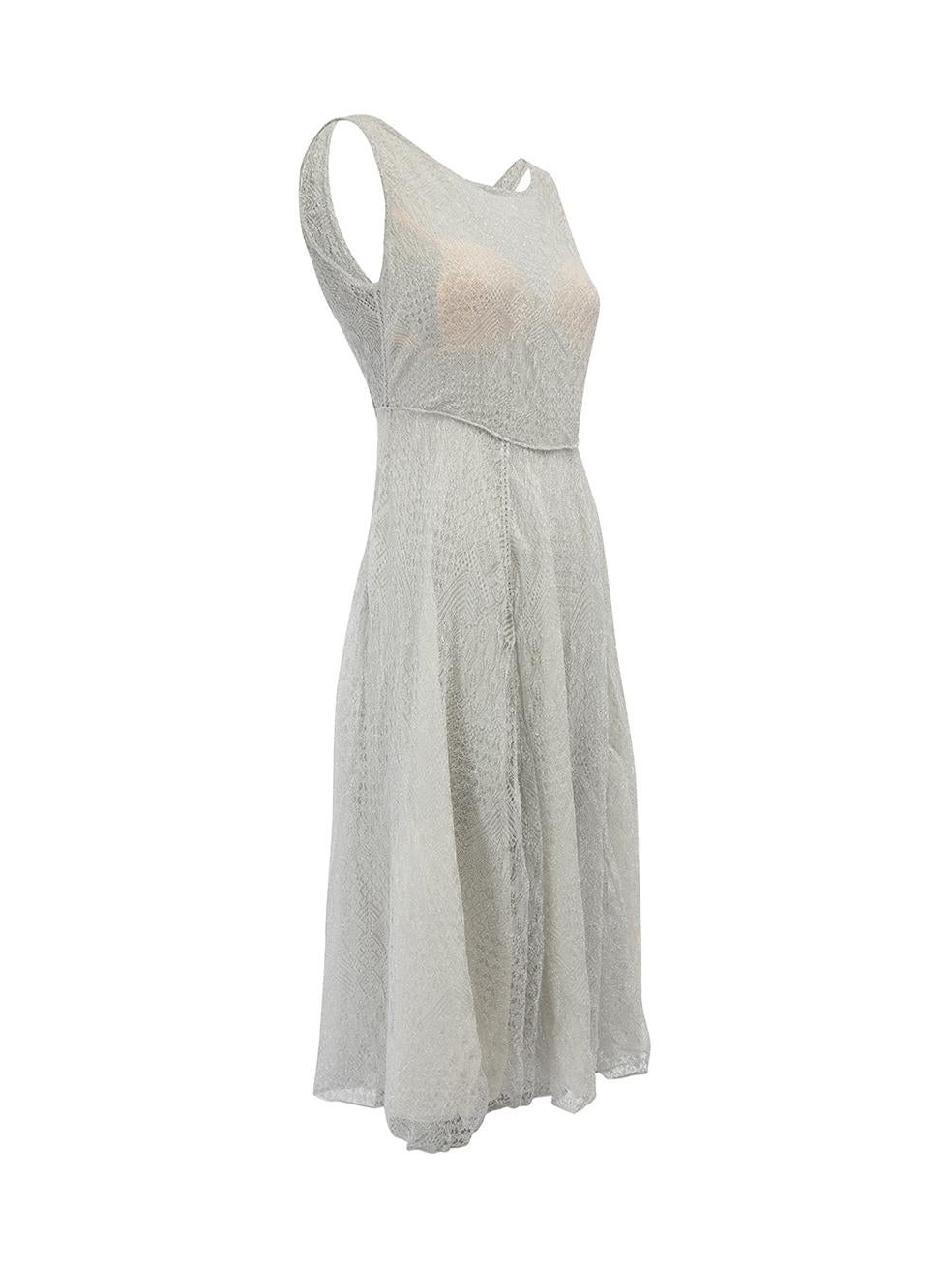 CONDITION is Very good. Minimal wear to dress is evident. Minimal wear to the cup inserts where marks can be seen on this used Missoni designer resale item. Details Metallic silver Viscose Knee length dress Abstract pattern Round neckline Open back