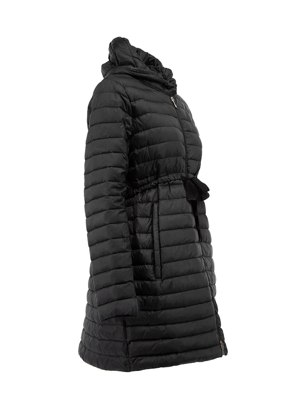 CONDITION is Very good. Minimal wear to coat is evident. Minimal wear/marks seen to the outer nylon fabric, the drawstring and interior of hood on this used Moncler designer resale item Details Black Polyamide Goose down Figure hugging Belted waist