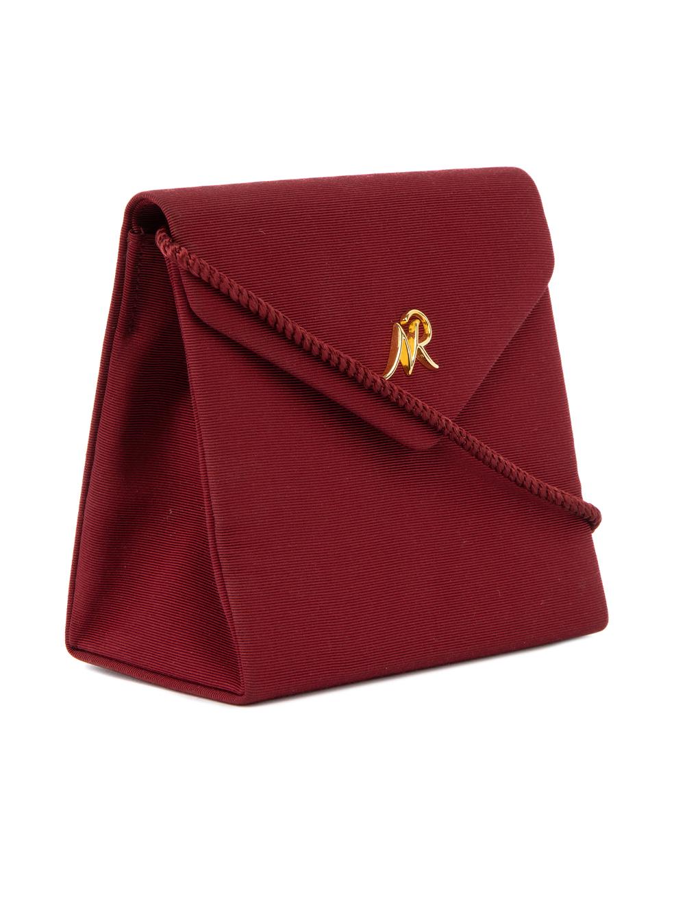 CONDITION is Very good. Hardly any wear to bag is evident. Slight dent can be seen to the front left on this used Nina Ricci designer resale item. Details Burgundy Cloth textile Mini crossbody Envelope flap with magnetic button closure Golf NR logo