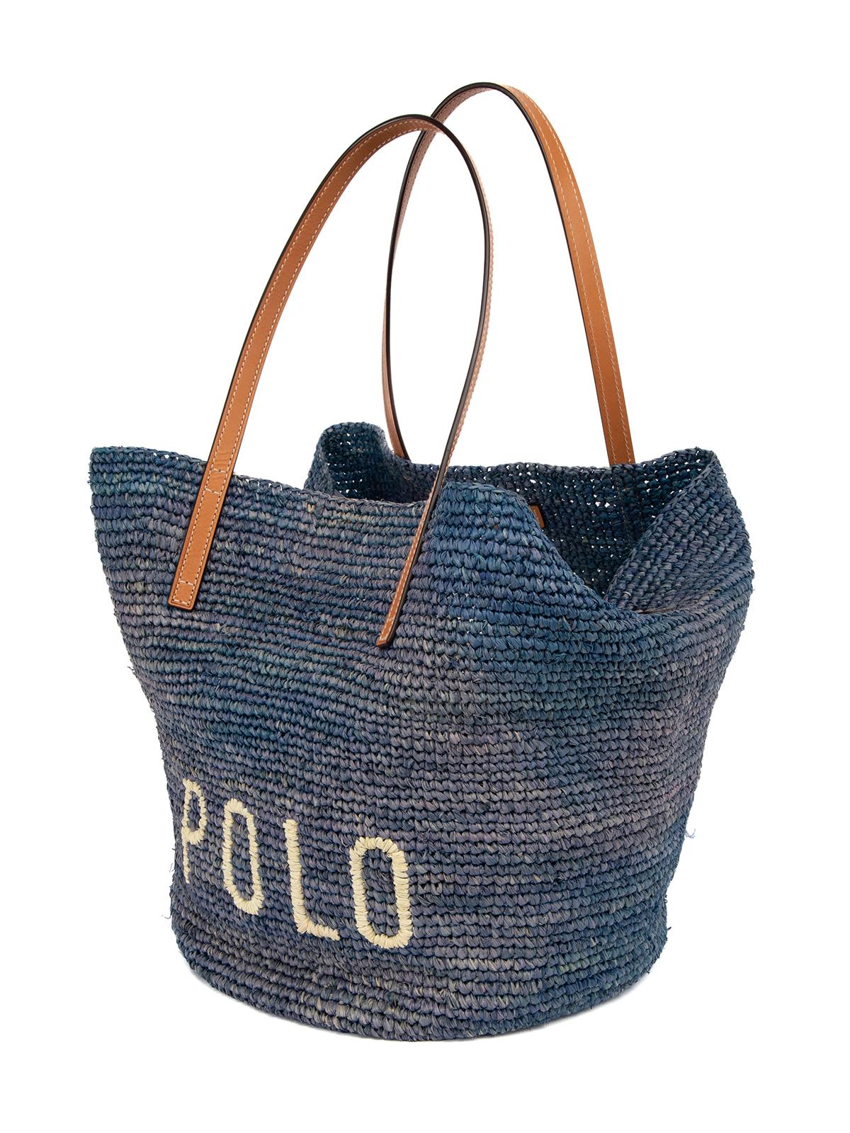 CONDITION is Very Good. Minor wear to bag is evident. Light wear to bag exterior wear loose straw material can be see on this used Polo Ralph Lauren designer resale item. Details Blue Wicker Leather handles One main compartment Composition Wicker,