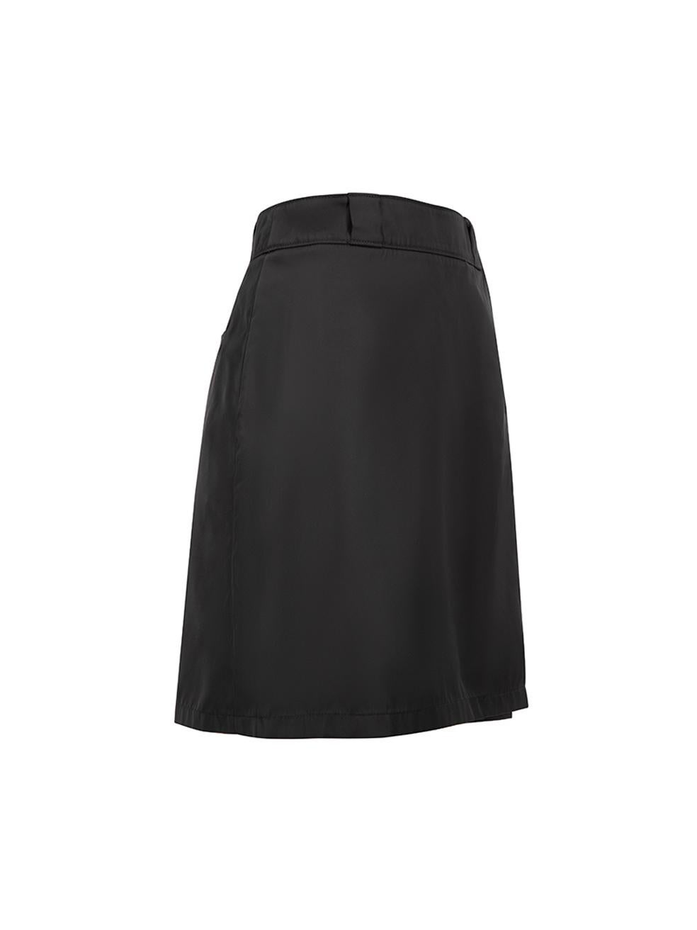 CONDITION is Very good. Hardly any visible wear to skirt is evident on this used Prada designer resale item. Details Black Synthetic Mini skirt Wrap front with clasps and button closure Belt hoops Back welt pockets Made in Romania Composition 100%