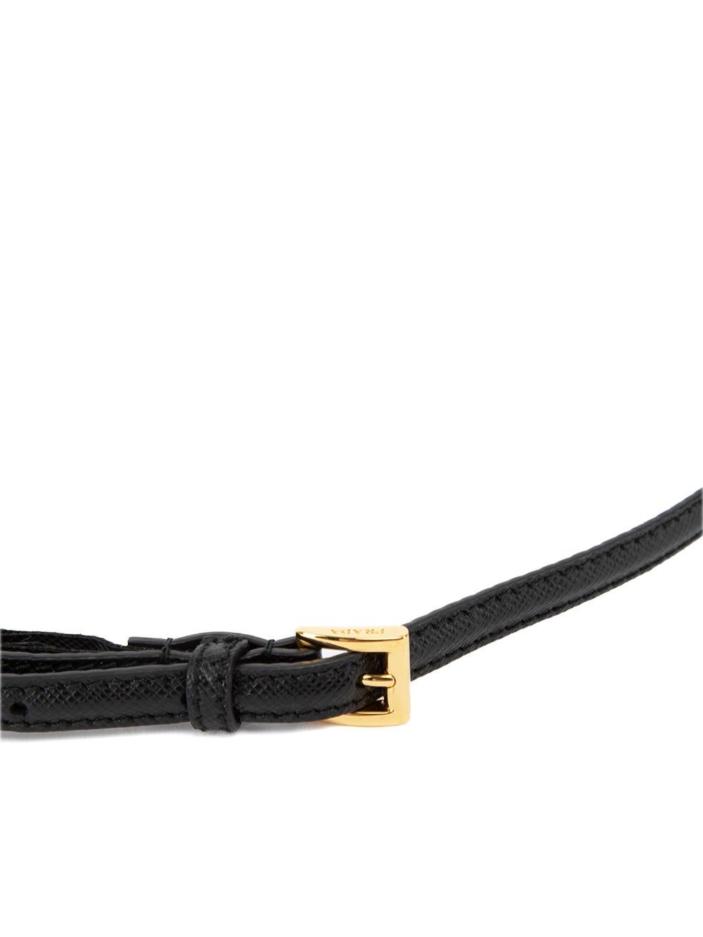 CONDITION is Very good. Hardly any visible wear to belt is evident. Minor loose threads seen around the buckle is seen on this used Prada designer resale item. Details Black Leather Thin skinny belt Gold tone buckle fastening Made in Italy