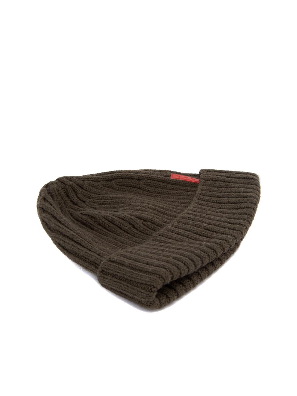 CONDITION is Very good. Hardly any visible wear to hat is evident on this used Prada designer resale item. Details Khaki Wool Ribbed knit beanie Red Prada logoon exterior Made in Italy Composition 100% Wool Care instructions: Professional dry clean