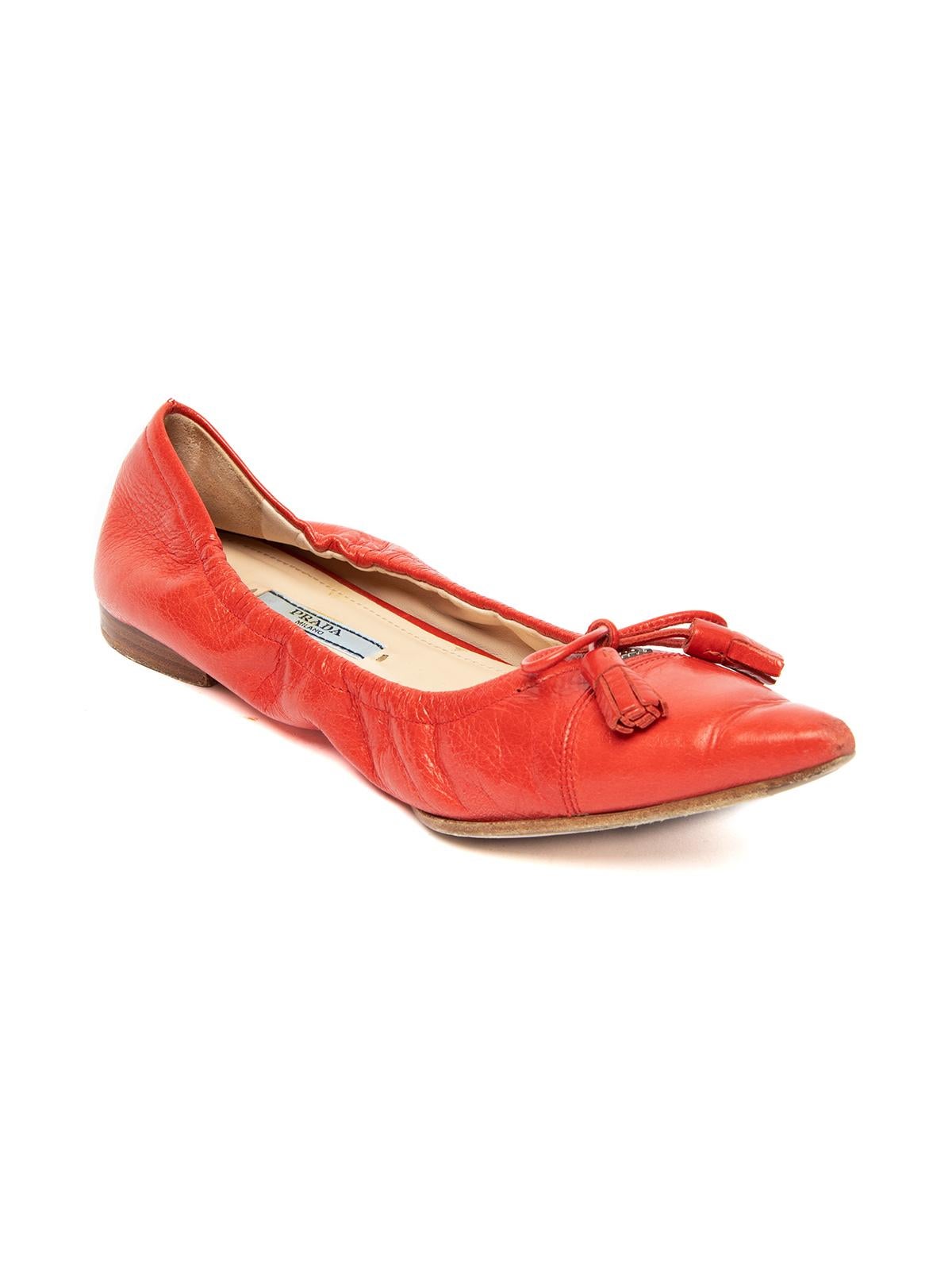 CONDITION is Good. Minor wear to shoes is evident. This item shows general wear to areas such as the toe ends, heel area and soles on this used Prada designer resale item. Details Colour - red Material - leather Style - ballerina Toe style -