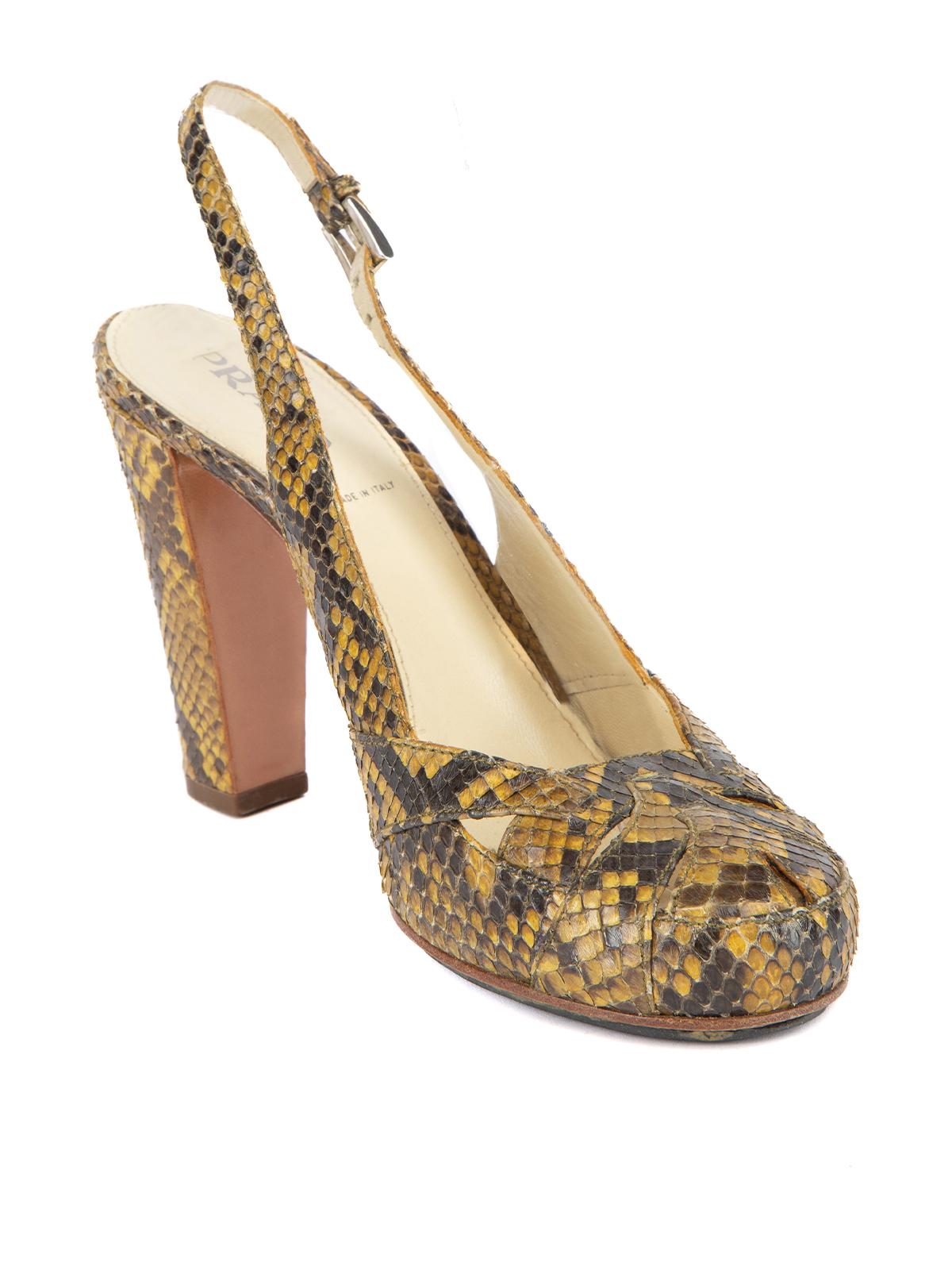 CONDITION is Good. Minor wear to heels is evident. Light wear to exterior snakeskin material on this used Prada designer resale item. Please note these shoes have been resoled for extra protection. Details Olive green and brown Python leather Heels