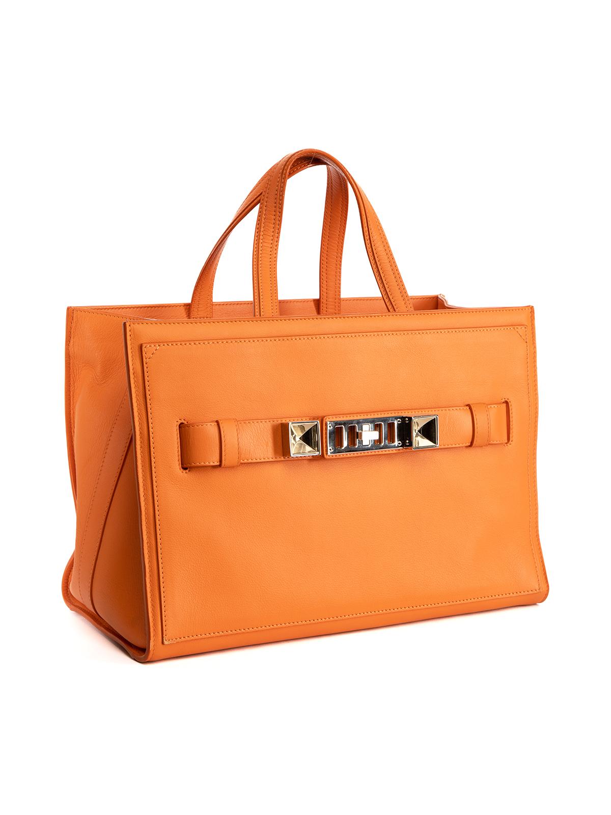 CONDITION is Very good. Minimal wear to bag is evident. Minimal wear to leather exterior and interior on this used Proenza Schouler designer resale item. Details Orange Leather Gold tone hardware Zip closure One main compartment Internal brand name