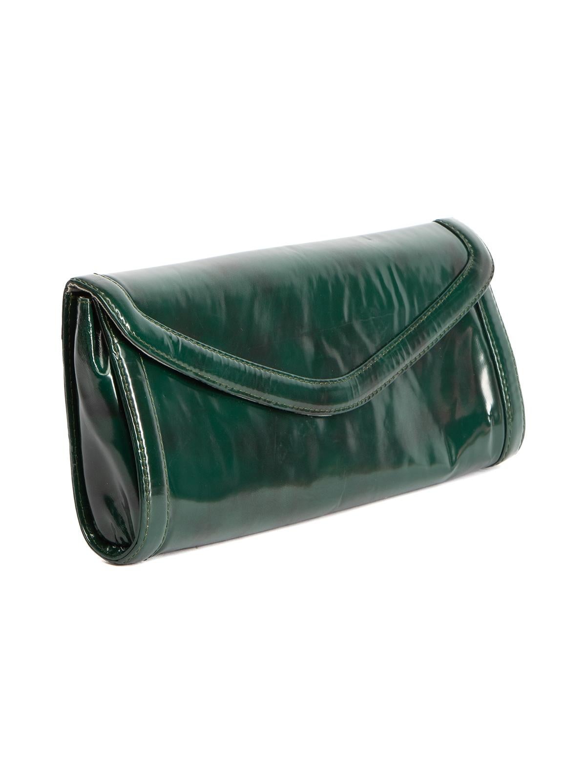 CONDITION is Good. Minor wear to clutch is evident. Light wear to Leather exterior with some creasing seen on this used Pura Lopez designer resale item. Original dust bag included. Details Green Leather Clutch Magnetic closure One main compartment