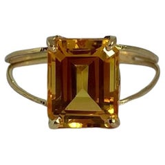 Retro Pre-loved ring made of 18 carat gold with beautiful emerald faceted citrine