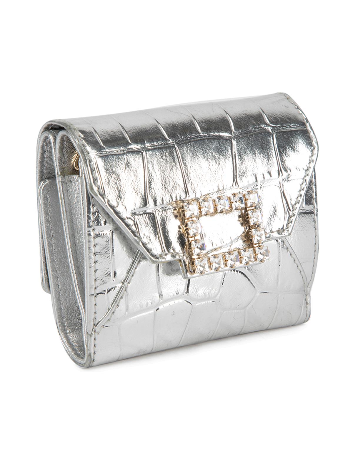 CONDITION is Very good. Hardly any visible wear to pouch is evident. There is minimal wear to the bottom of pouch on this used Roger Vivier designer resale item. This item comes with the original dustbag. Details Silver Leather Mini wallet Crocodile