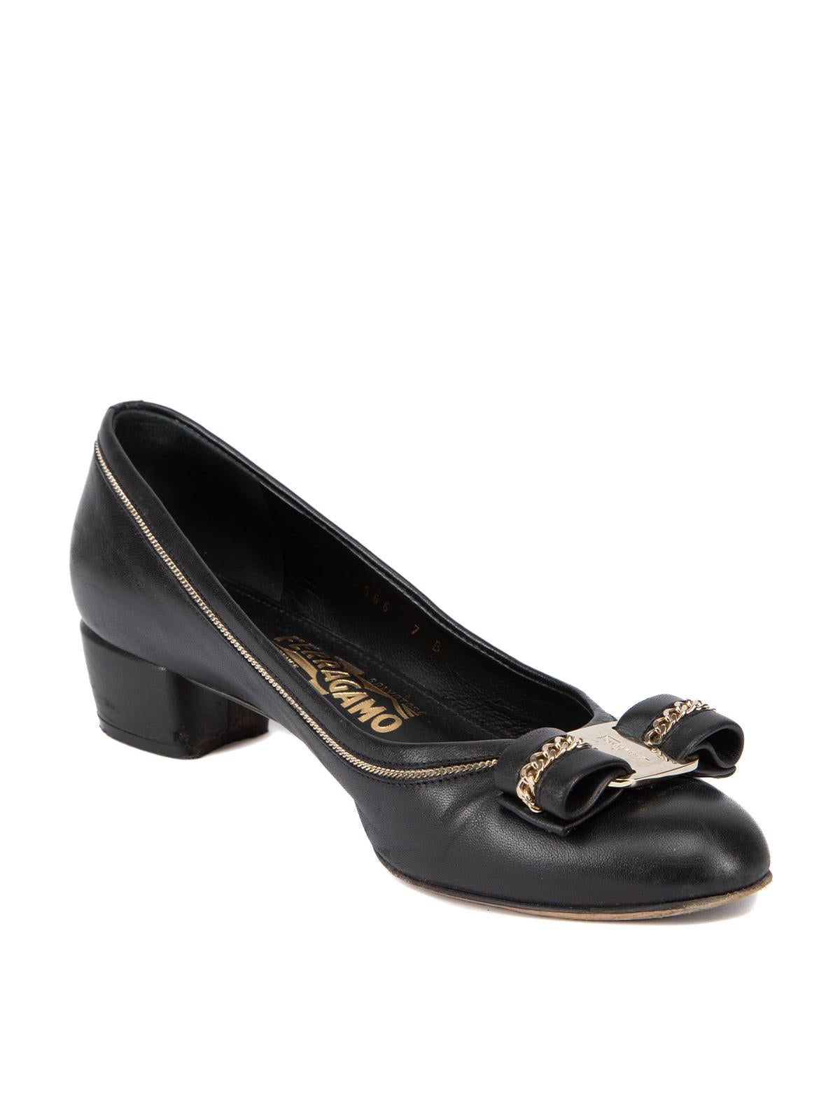 CONDITION is Very good. hardly any visible wear to shoes is evident. Light scuffs can be seen to the gold tone hardware on this used Salvatore Ferragamo designer resale item. Details Black Leather Pumps Round toe Kitten block heel Slip on Gold tone