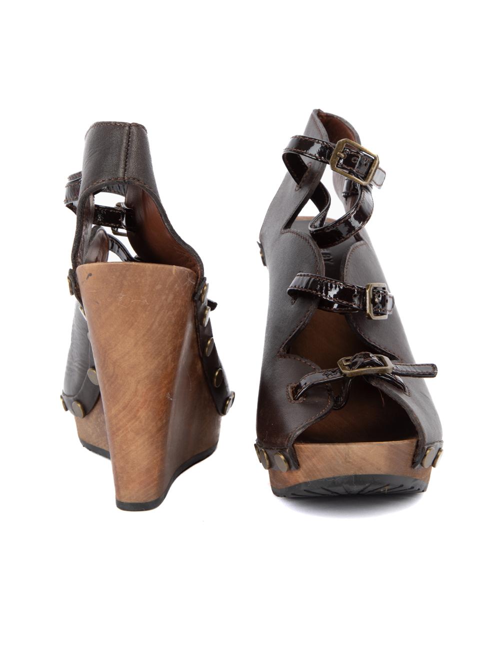 CONDITION is Very Good. Minimal wear to wedges is evident, minimal scratches and indents can be seen on the wooden heel of this used See by Chloé designer resale item. This item comes with original dustabg. Details Brown Leather Heeled wedges Peep