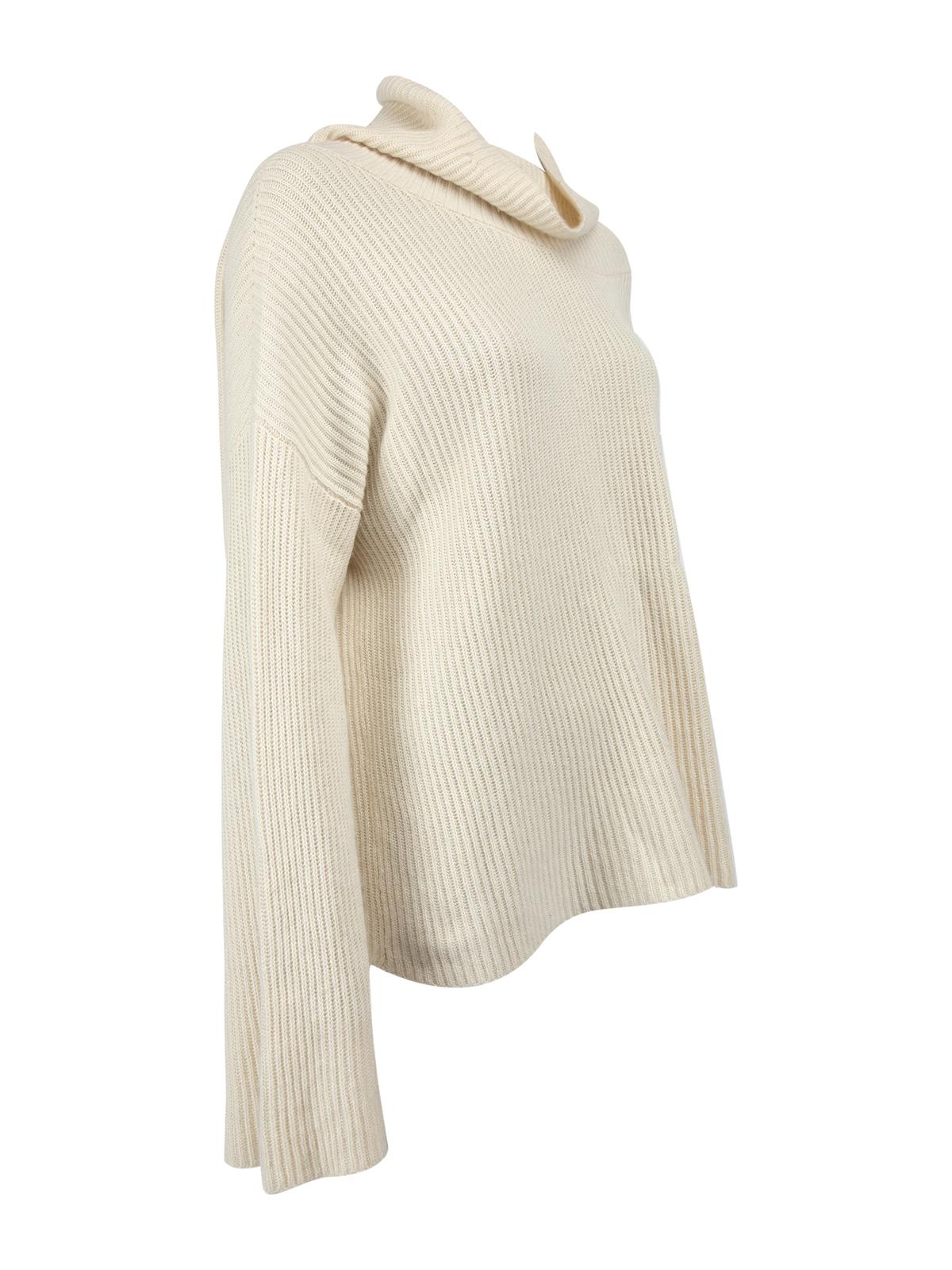 CONDITION is Very good. Minimal wear to sweater is evident. Minimal pilling seen on this used The Row designer resale item. Details Cream Cashmere Knit sweater Turtleneck Oversize Long wide sleeves Made in USA Composition 50% Cashmere and 50% Silk