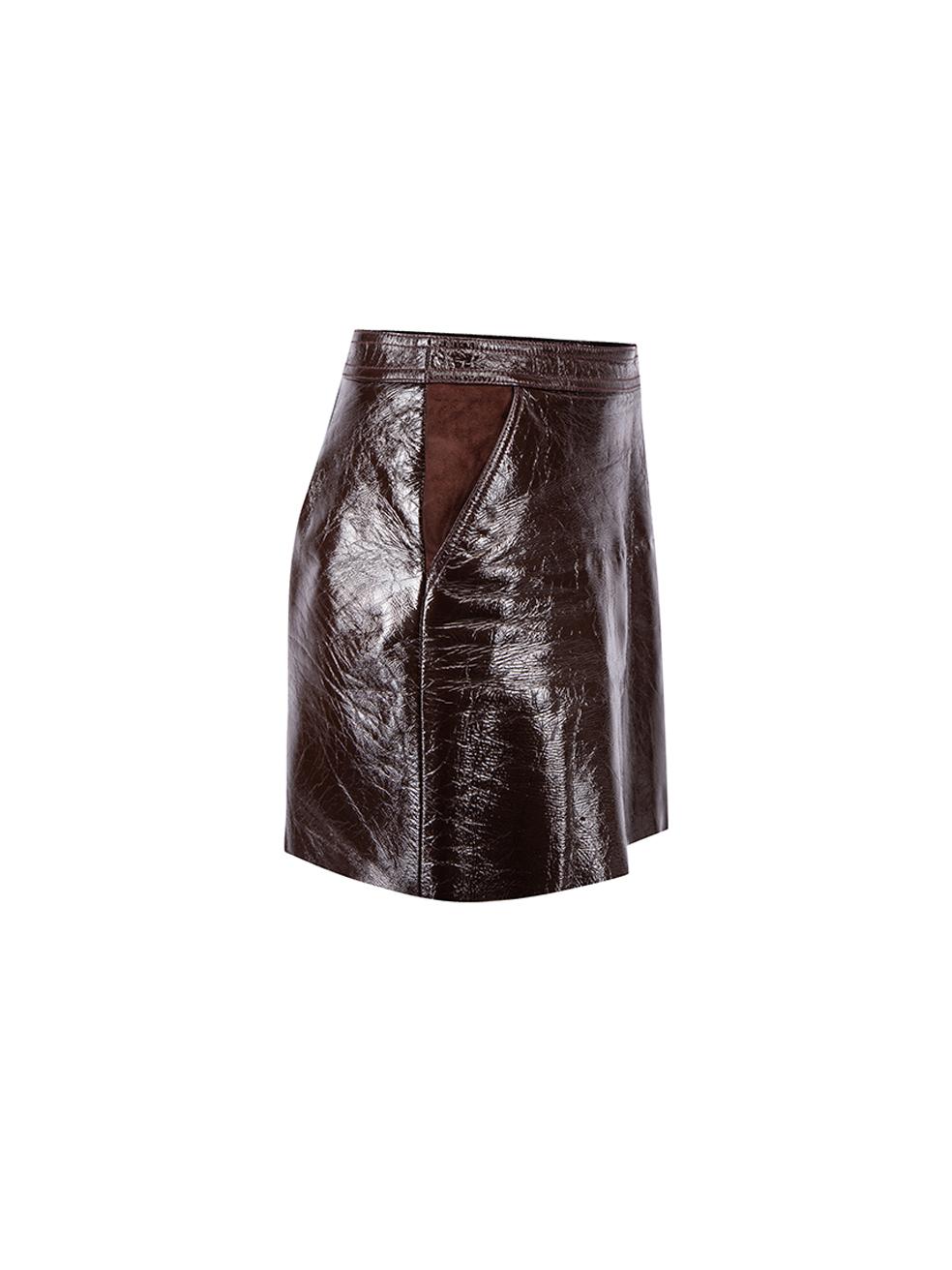 CONDITION is Very good. Minimal wear to skirt is evident. Minimal wear to the suede pockets and the outer vinly fabric on this used Theory designer resale item. Details Brown Patent leather Mini skirt Front zip closure with button Front side pockets