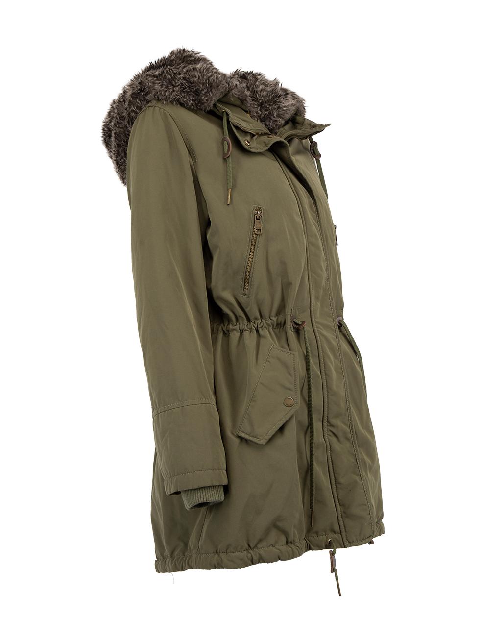 CONDITION is Very good. Minimal wear to parka is evident. Minimal wear to the fur insert and there is a ver small mark at the bottom of the parka on this used Tommy Hilfiger designer resale item. Details Khaki Polyester Parka coat Mid length Padded