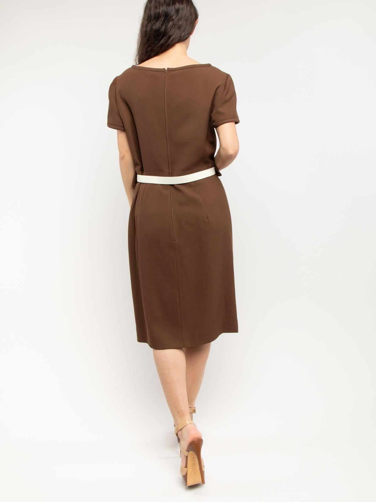 CONDITION is Very good. Minimal wear and pilling to dress is evident. Creases to leather belt, slightly visible stains on belt of this used Valentino Boutique designer resale item. Details Valentino Boutique Brown Virgin wool Belted dress Regular