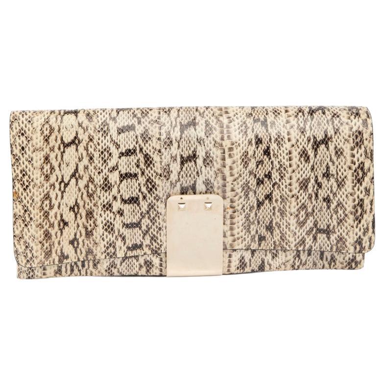 Pre-Loved Valentino Garavani Women
s Cream Python Rockstud Long Clutch Bag