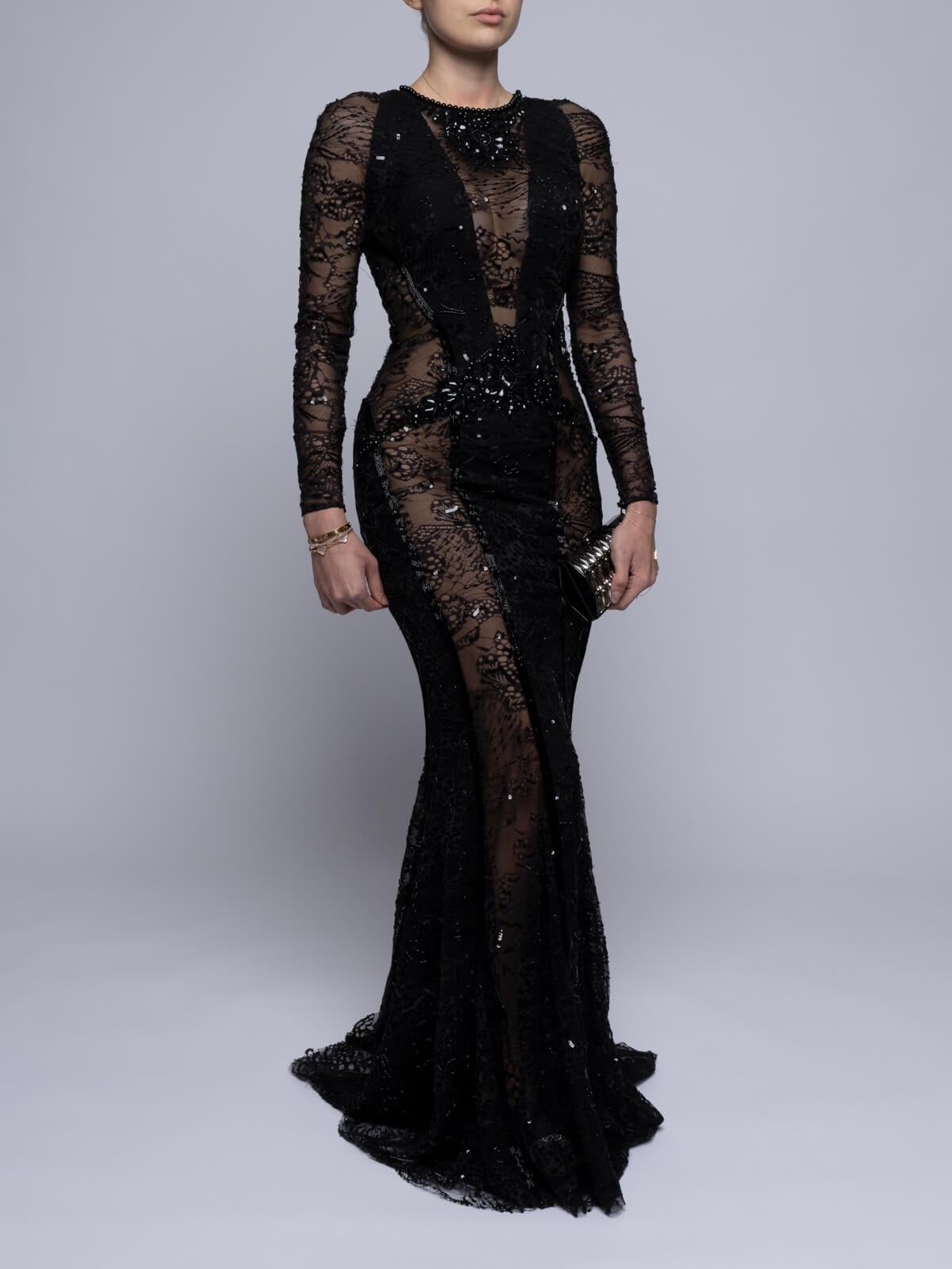 CONDITION Very good. Minor loose threads and wear evident on the lace. Minor wear on the embellishments. Minor stains on interior. Details Black Bodycon Zip closure Embroidered Made in Lebanon Composition 50% Silk, 50% Polyamide Fitting Information