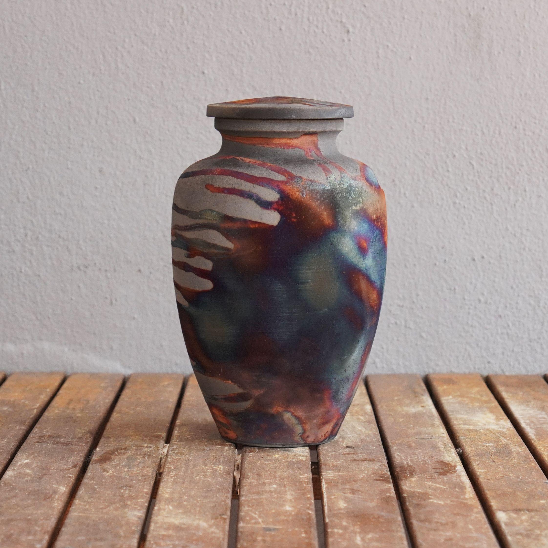 firing raku pottery creates a pattern that is