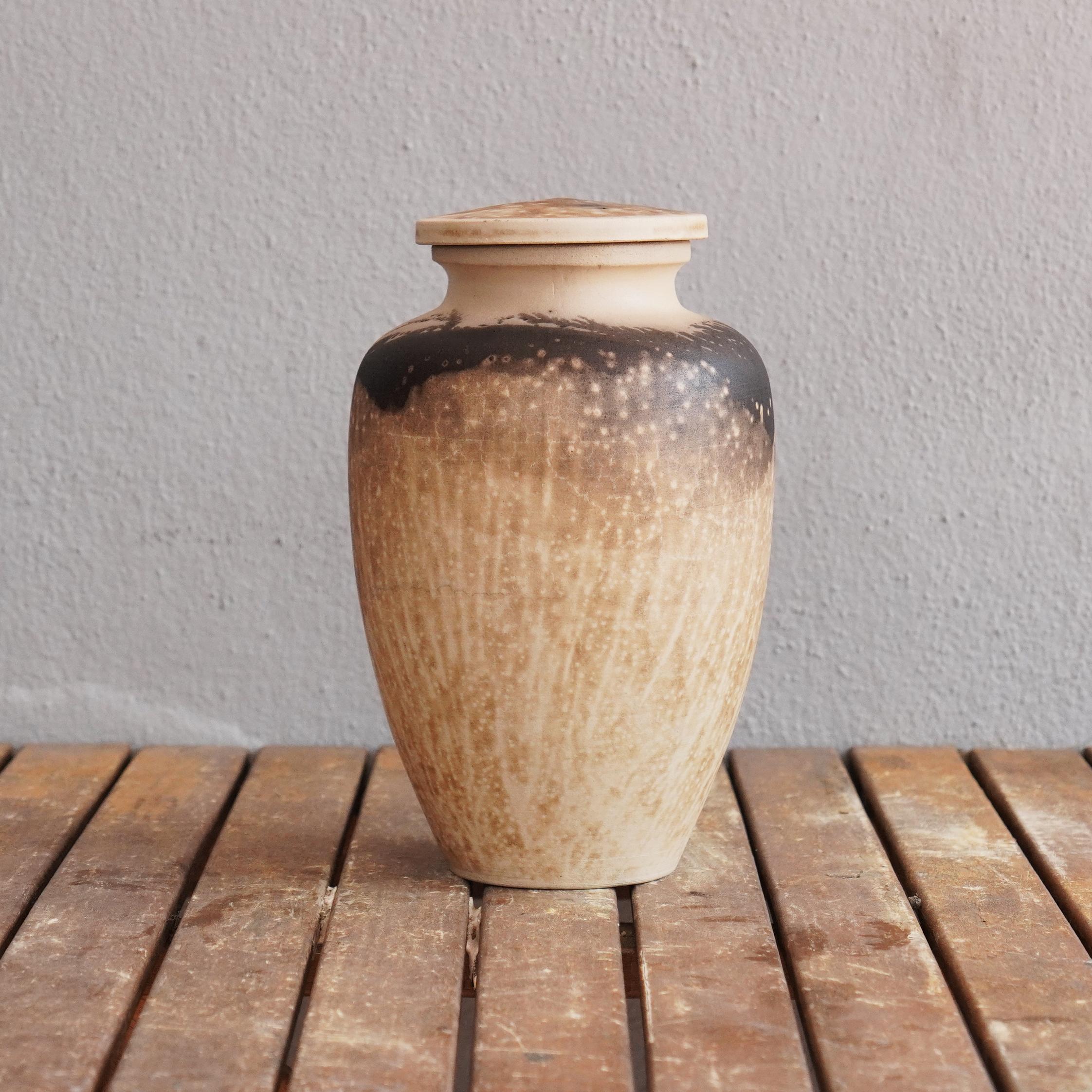 Omoide ~ (思い出) - memories
 
The passing of a loved one will always be a defining moment in a person's life. The Omoide Urn is a one of a kind ceramic piece that offers a focal point to reminisce on the memories left behind by your loved one.

Each