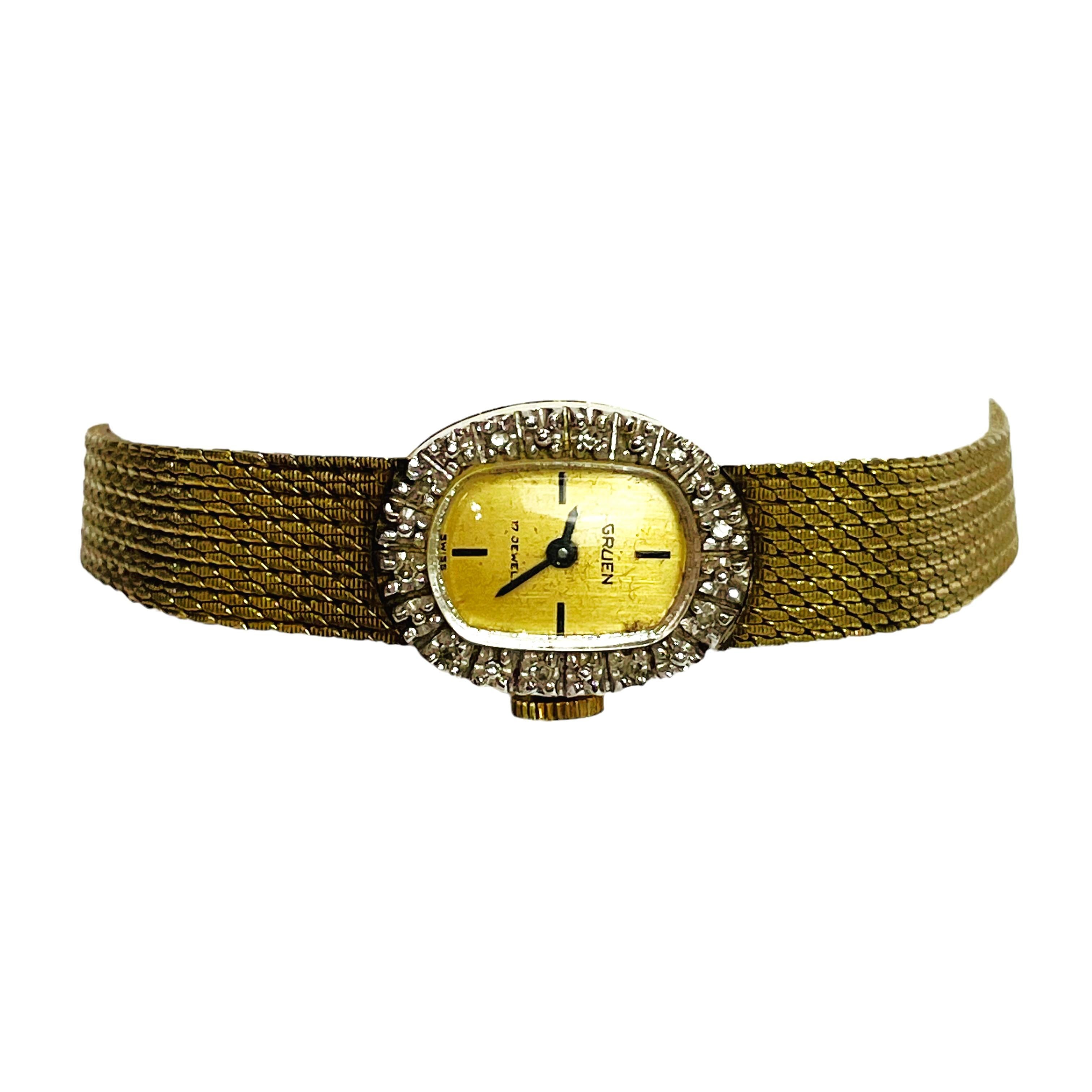 Woman's 14k Yellow Gold Italy 17 Jewel Watch with Diamonds. Watch has marks and scratches on it from being worn and used, overall sapphire crystal is fully clear and watch runs as it should.   Features 14k Yellow Gold Case and 10K Gold Filled Band.