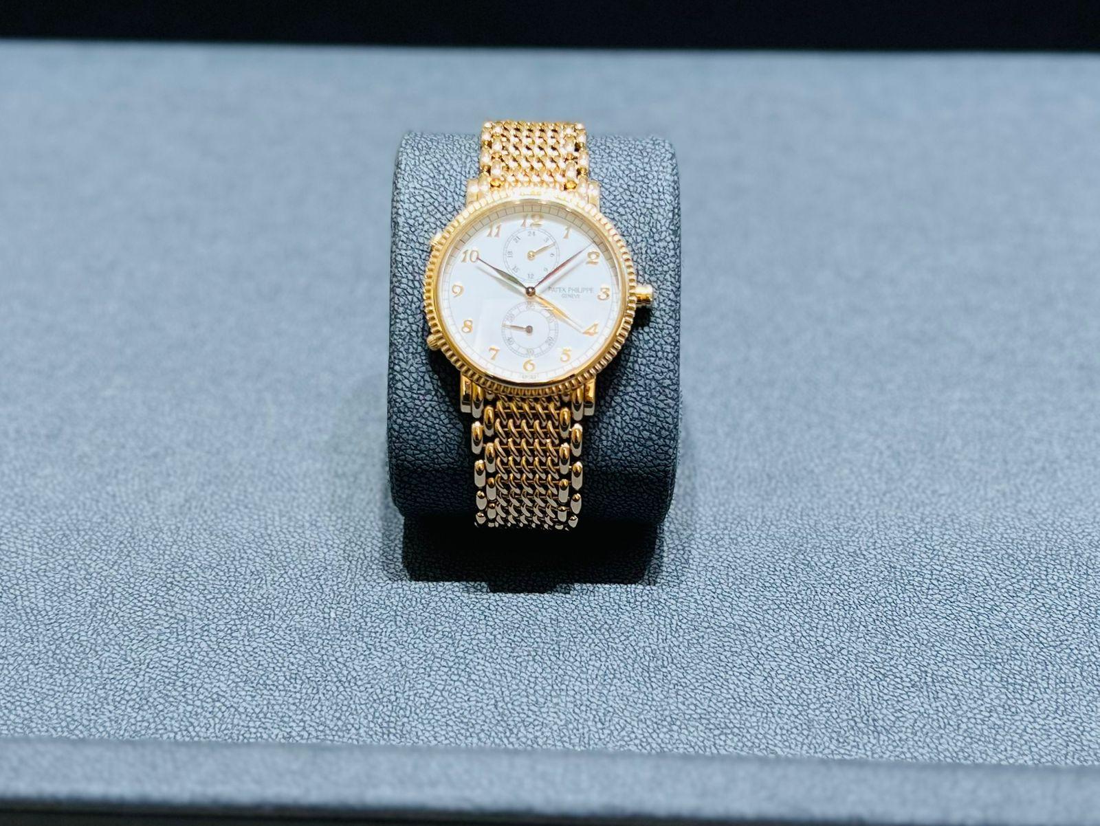 Modern (Pre Owned) 5034/1J - Travel Time -Bracelet Yellow Gold. For Sale
