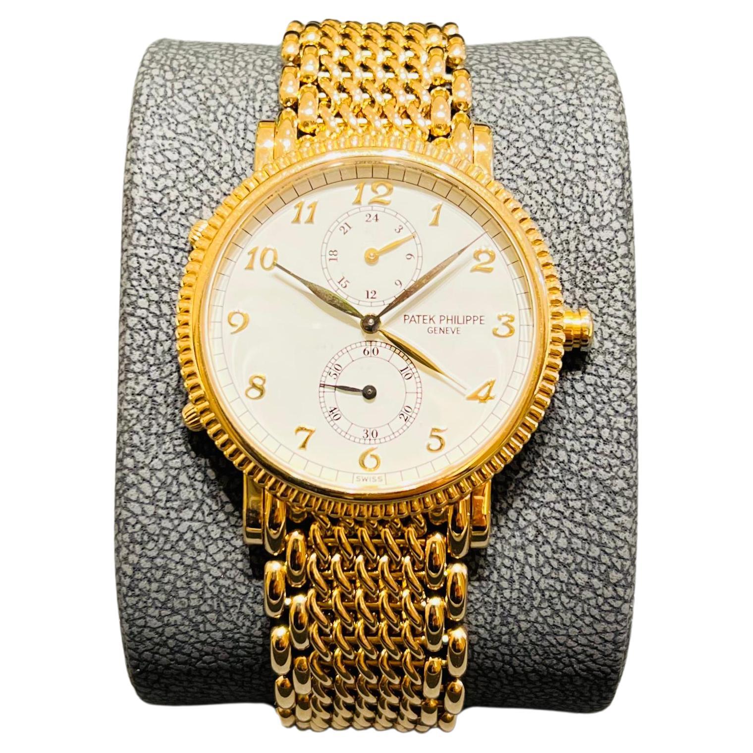 (Pre Owned) 5034/1J - Travel Time -Bracelet Yellow Gold. For Sale